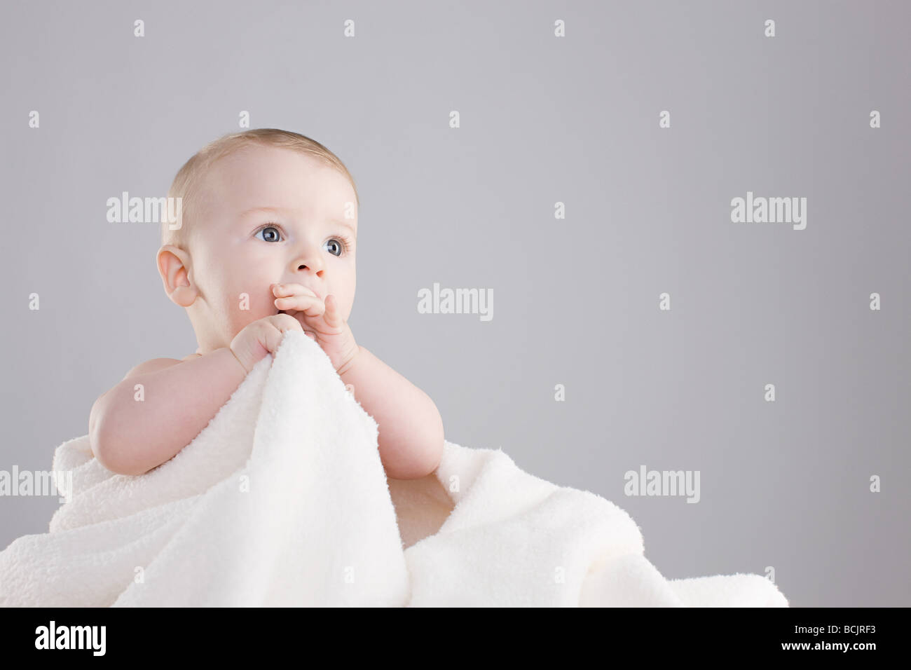 Baby in a blanket Stock Photo Alamy