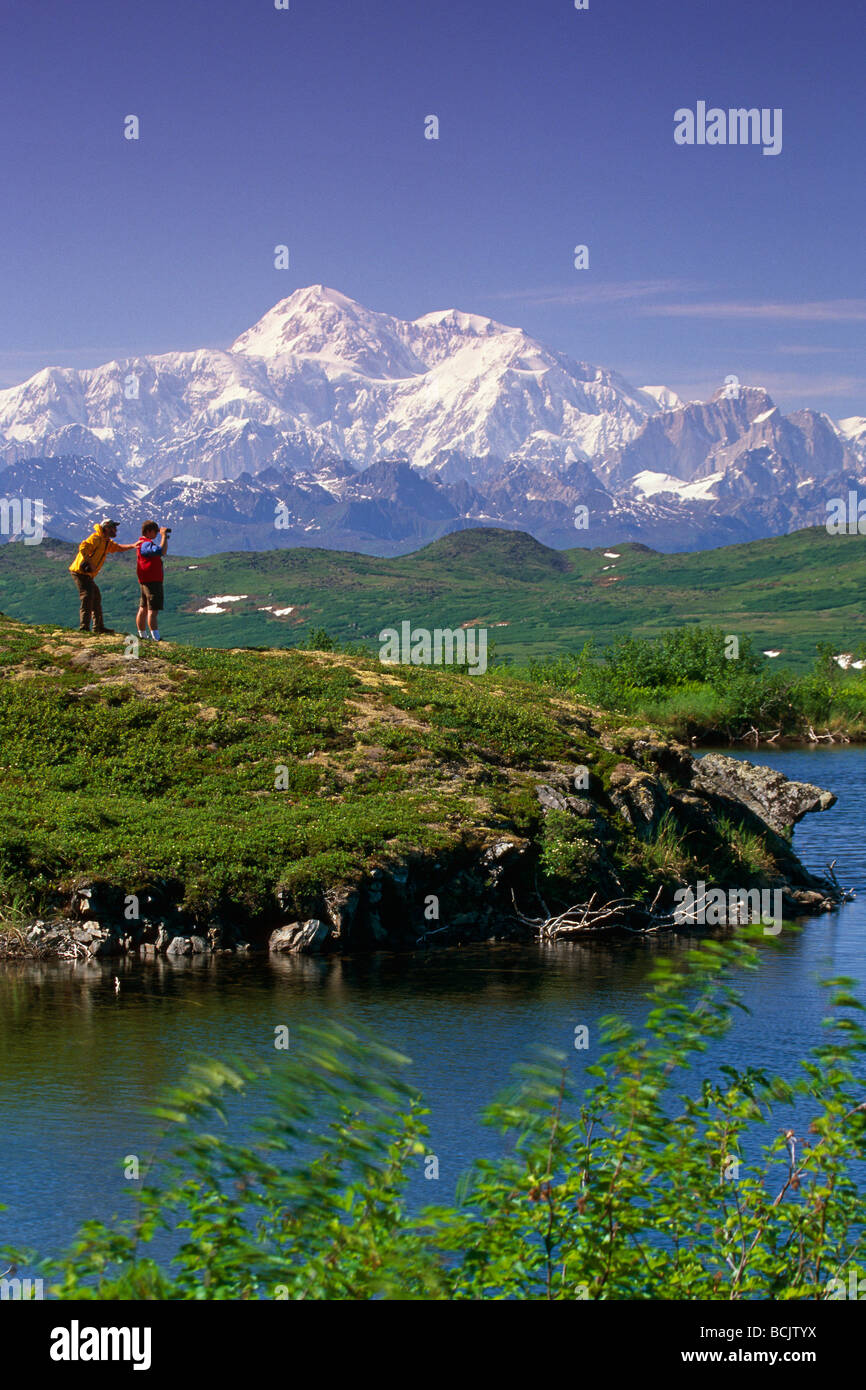 Hikers on Kesugi Ridge Denali SP AK w/Mt McKinley background SC Summer Stock Photo