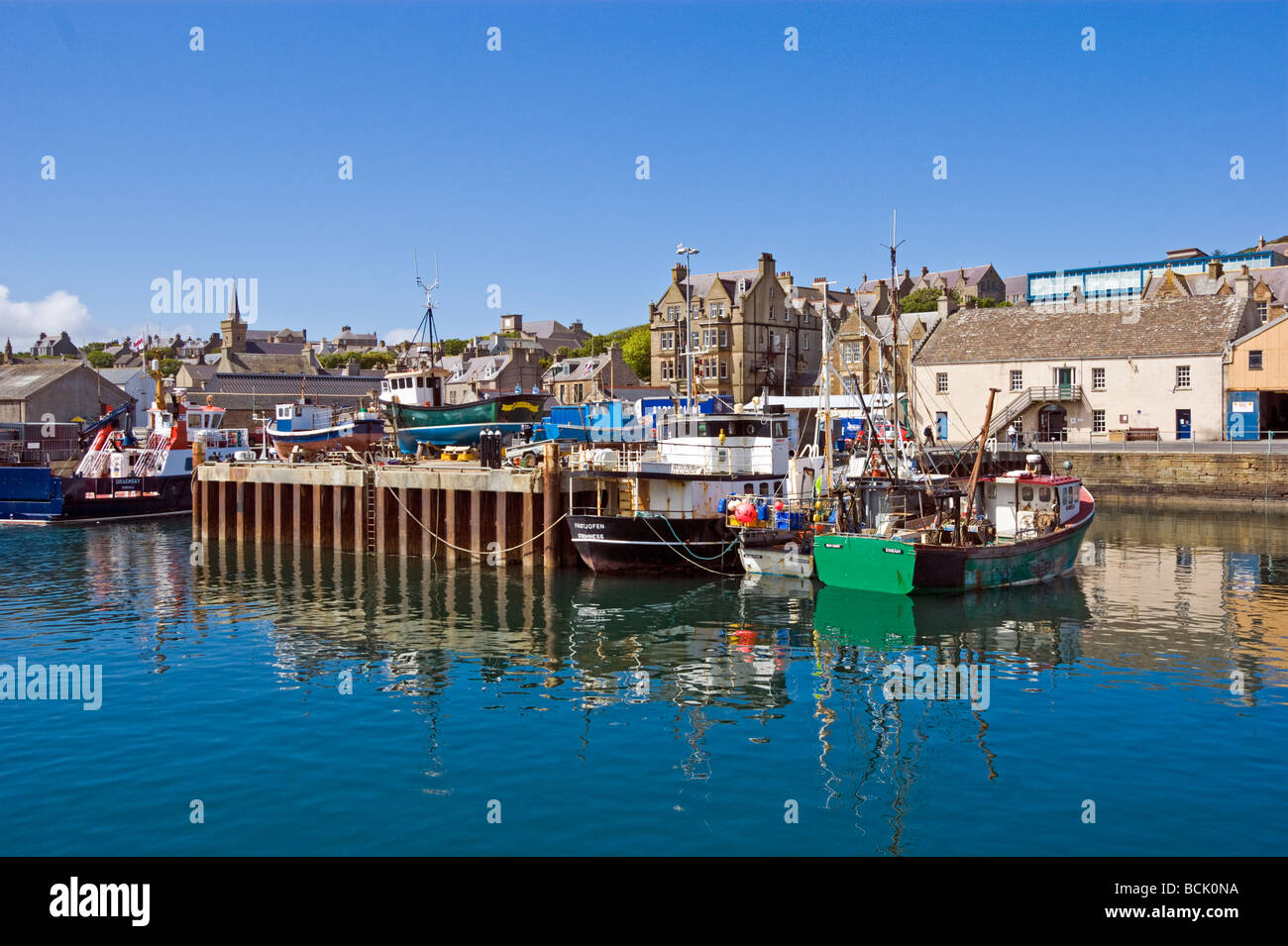 Stromness Harbour Orkney Scotland with fishing and pleasure boats on a sunny June day Stock Photo