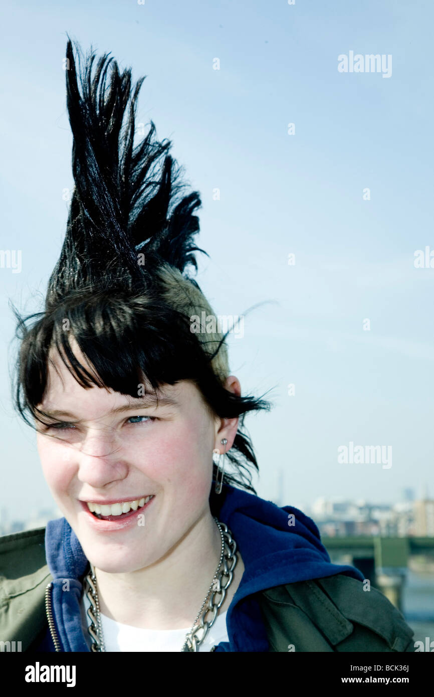 A punk girl 'Rae Ray Riots' with a large Mohican, London Bridge, London, UK 15.3.2009 Stock Photo
