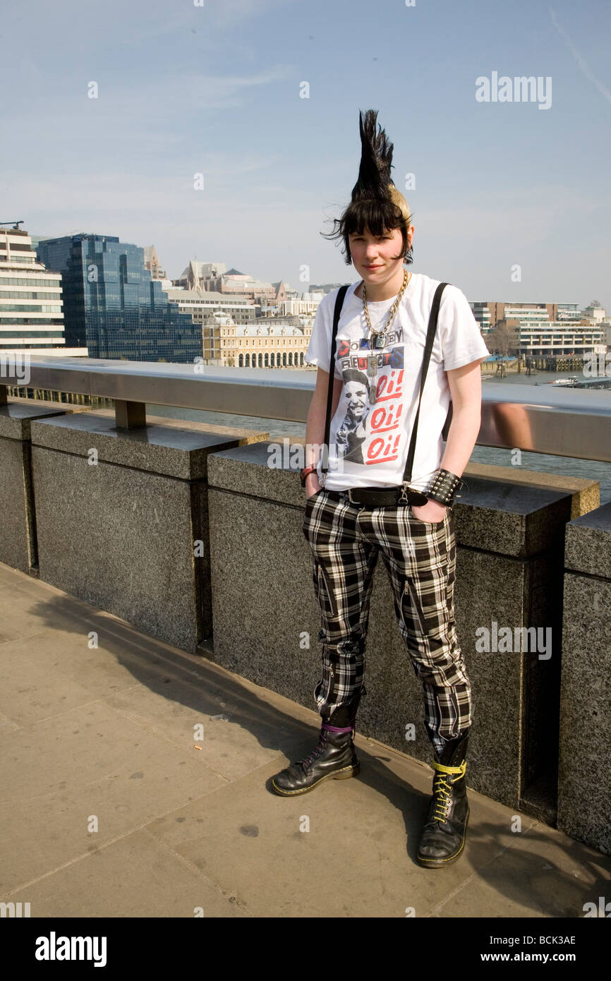 A punk girl 'Rae Ray Riots' with a large Mohican, London Bridge, London, UK 15.3.2009 Stock Photo