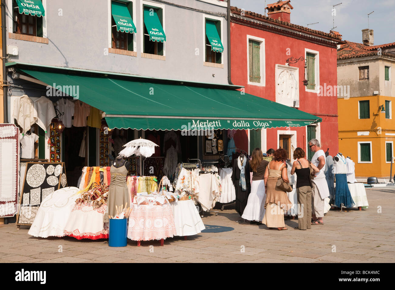 Venice - Burano colourful shopping with linen and lace Stock Photo