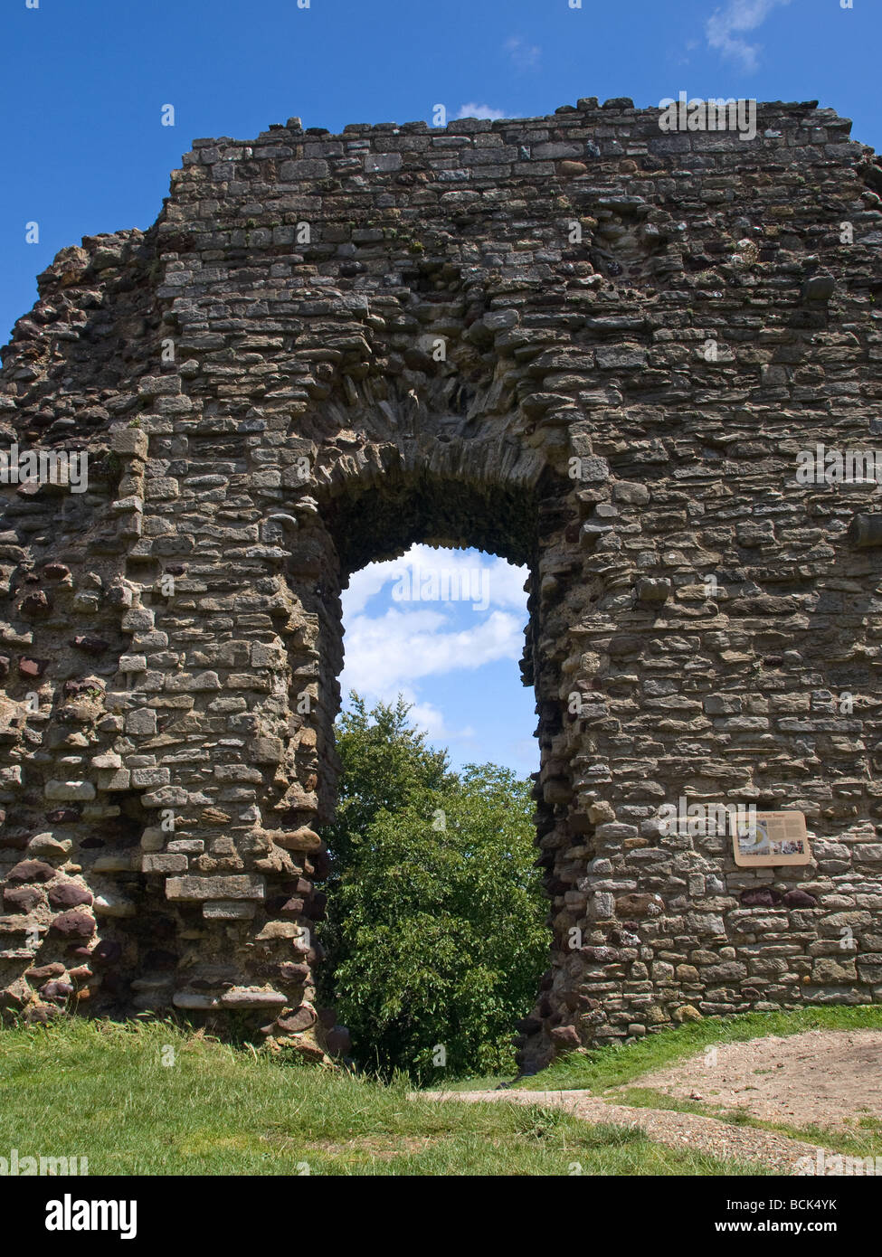 Part of the remains of the castle tower at Christchurch Priory Dorset England UK Stock Photo