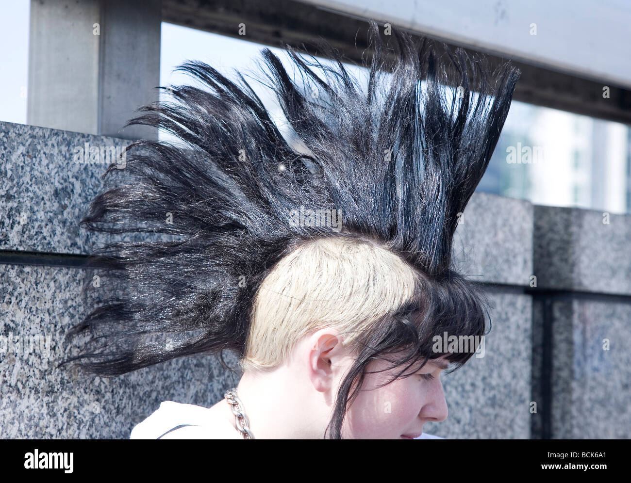 A punk girl with a large mohican, London Bridge, London, UK 2009 Stock Photo
