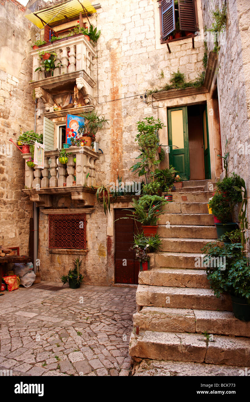 Stone balconies and stairs, Trogir Croatia Stock Photo