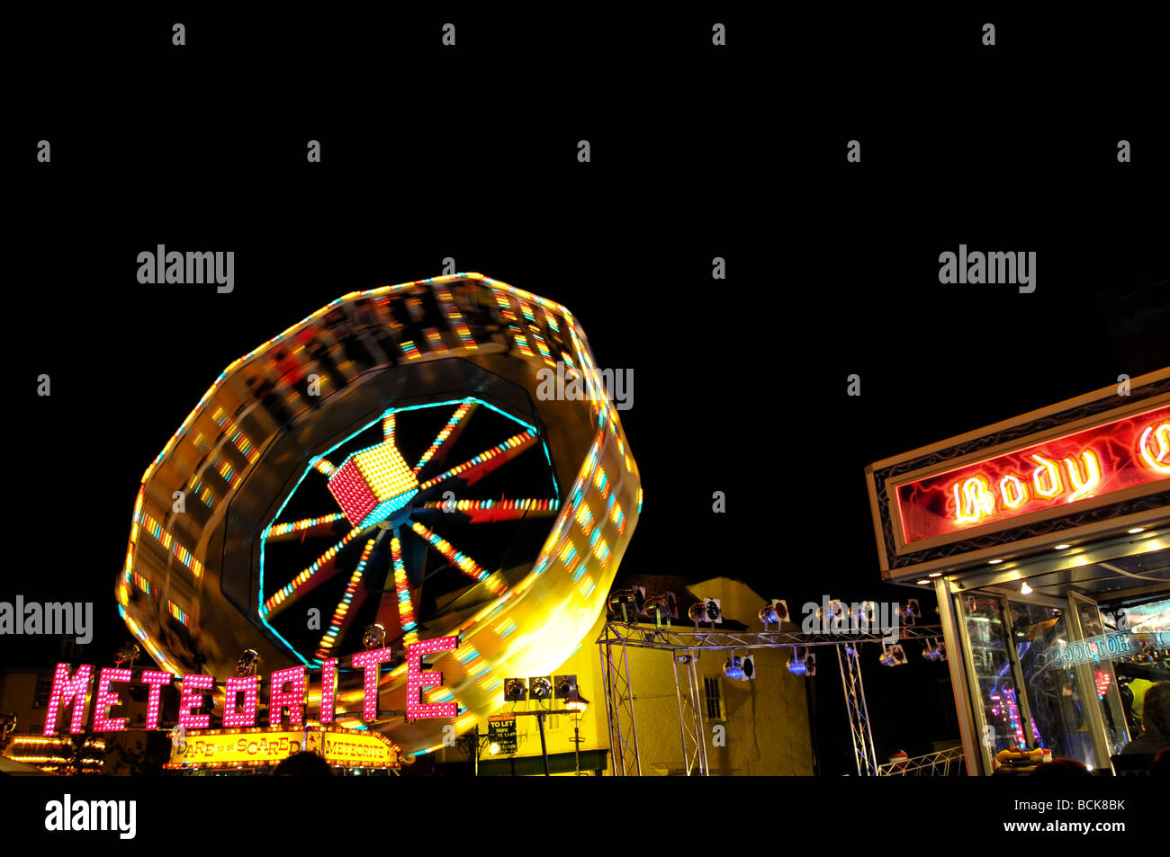 Spinning fairground meteorite ride in Abingdon Michaelmas Fair England Stock Photo