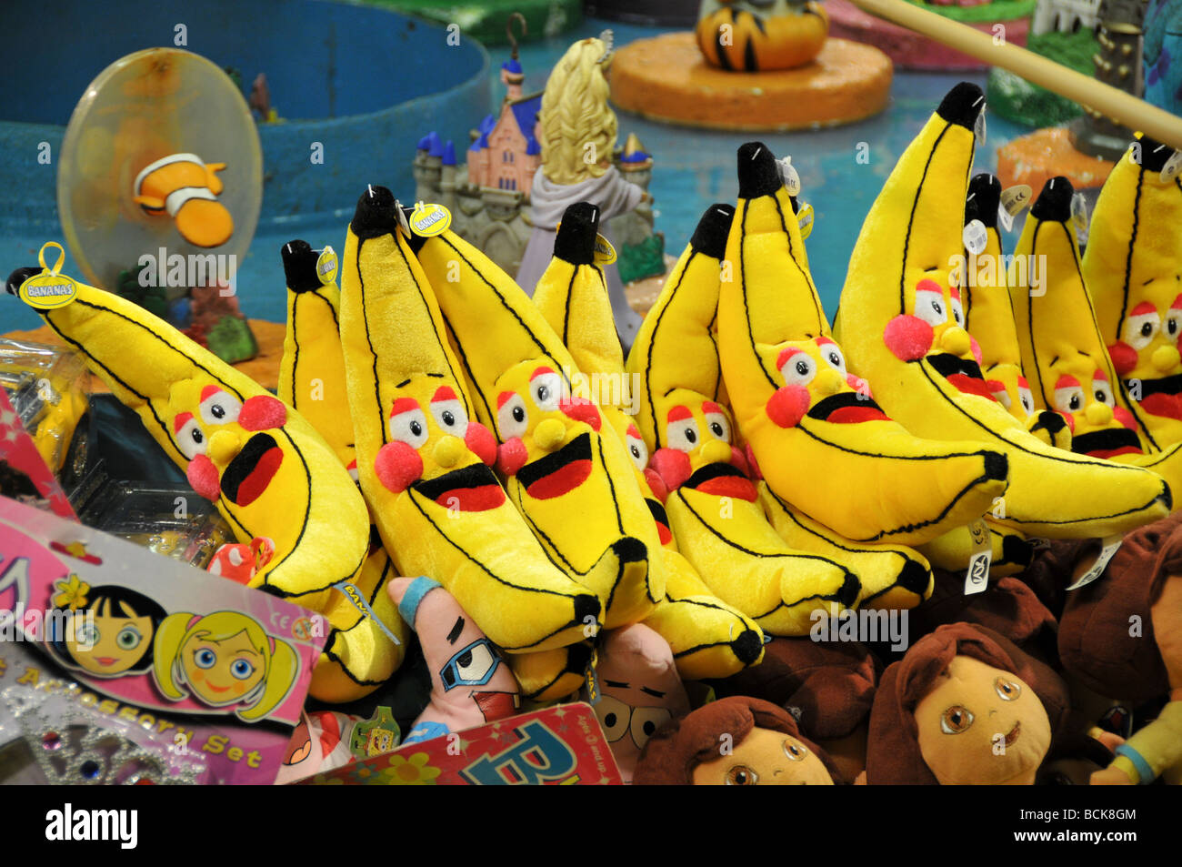 Banana shaped Soft toys in England, UK Stock Photo