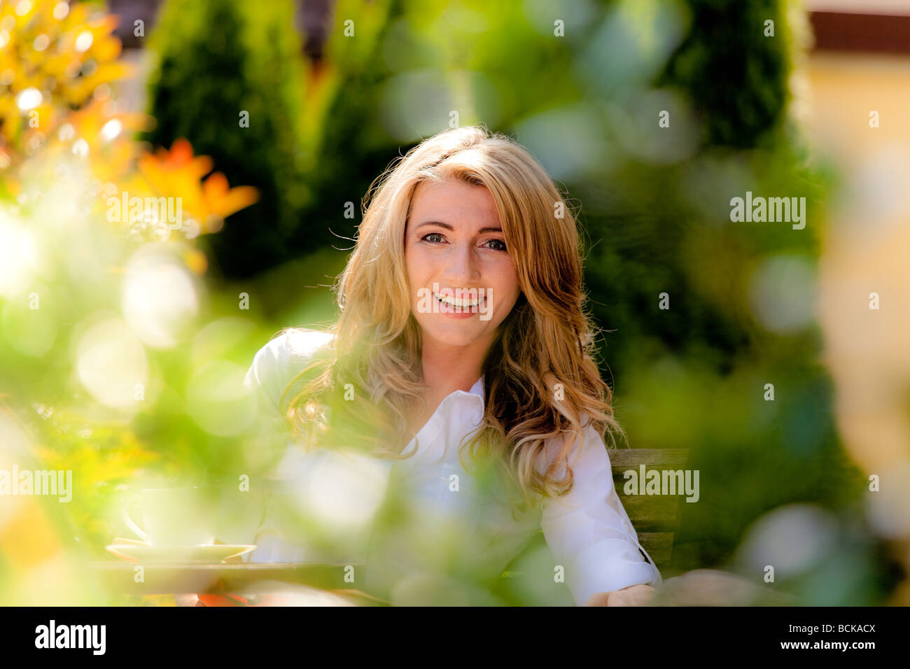 Portrait of a happy young woman Stock Photo - Alamy