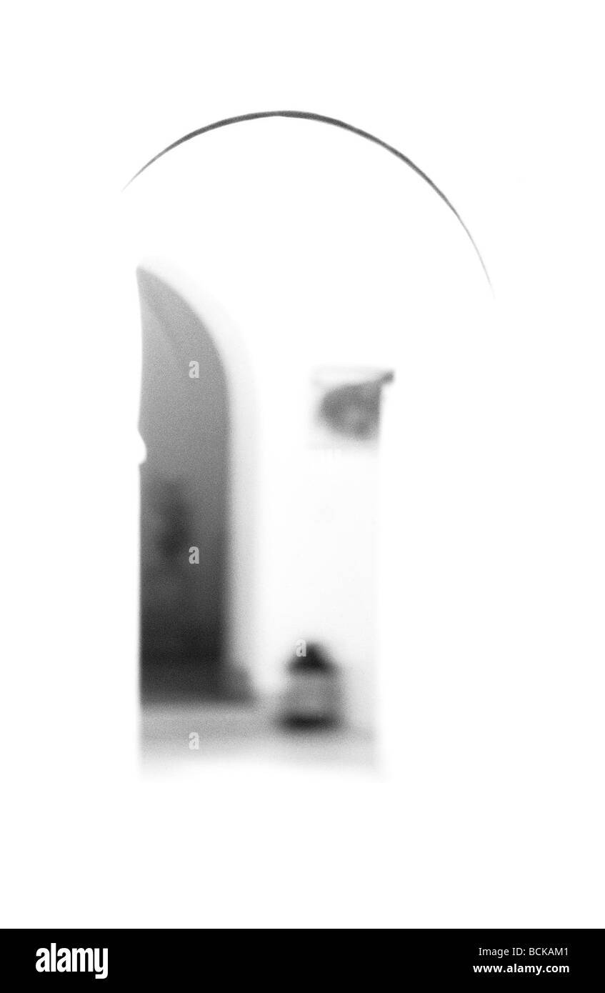 Arch and doorway, blurred and overexposed, b&w Stock Photo