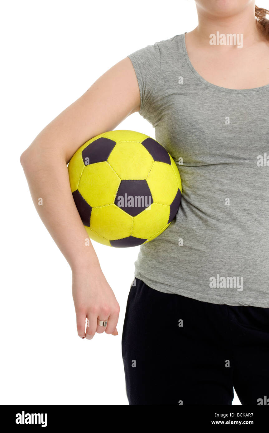 Young woman holding a soccer ball Stock Photo