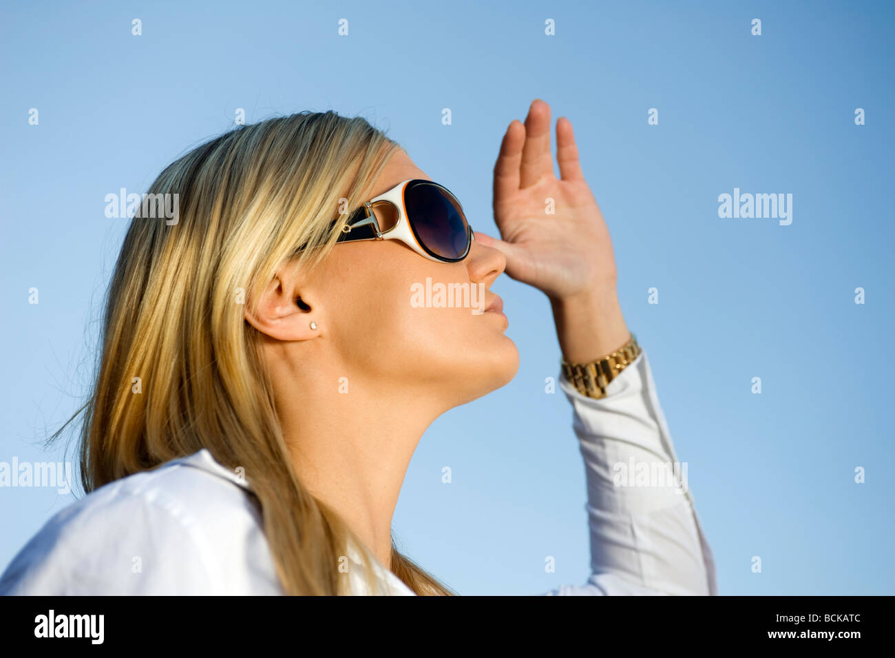 Female adult wearing sunglasses hi-res stock photography and images - Alamy