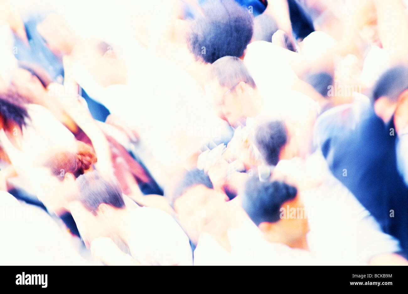 Crowd, head and shoulders, blurred Stock Photo - Alamy