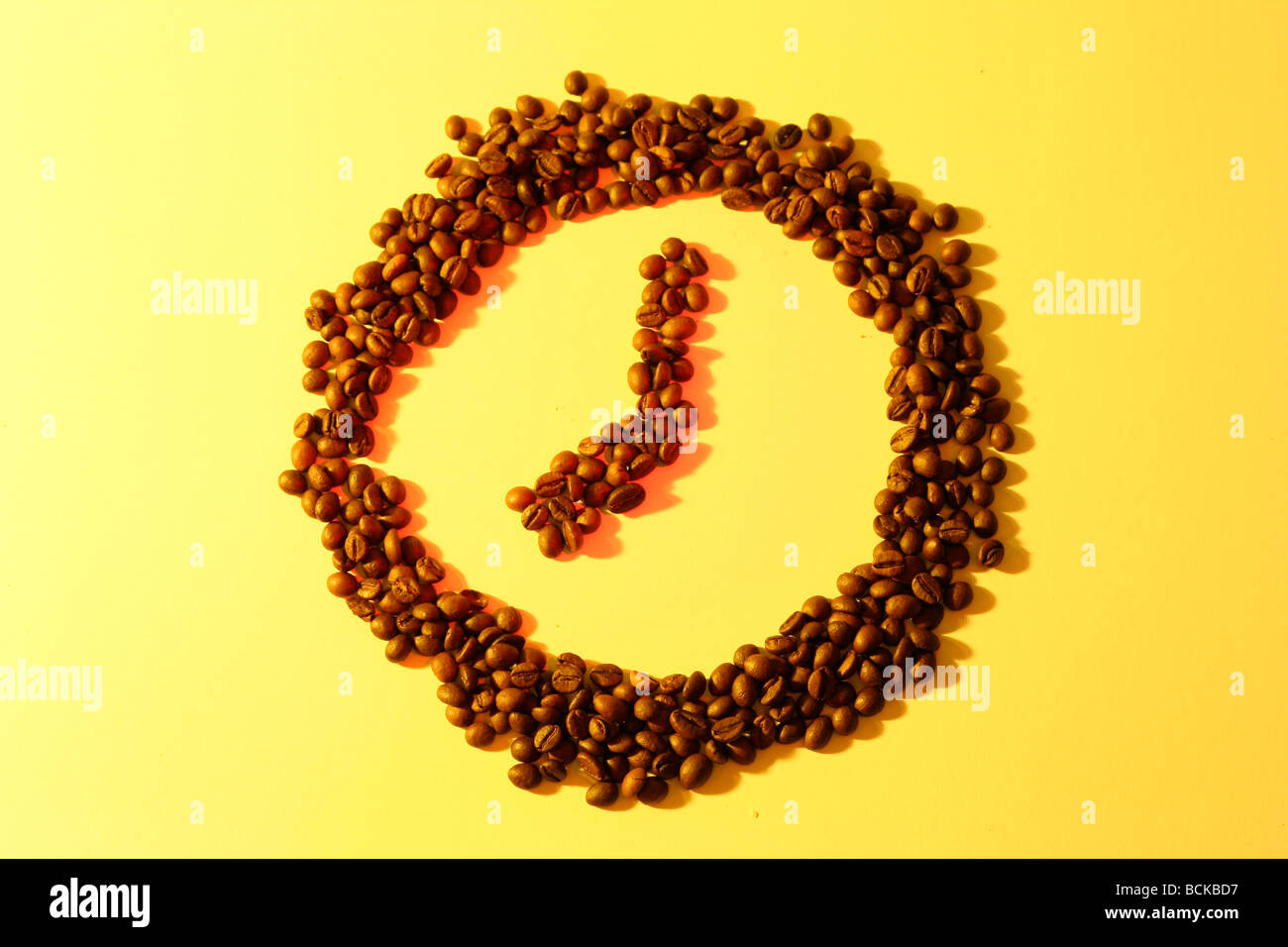 Clock made from coffee beans Stock Photo - Alamy