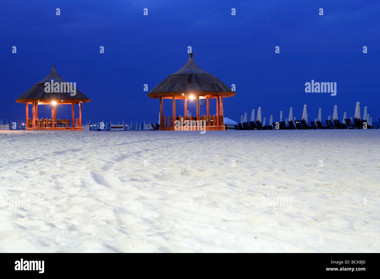 Restaurant on the beach at night Stock Photo