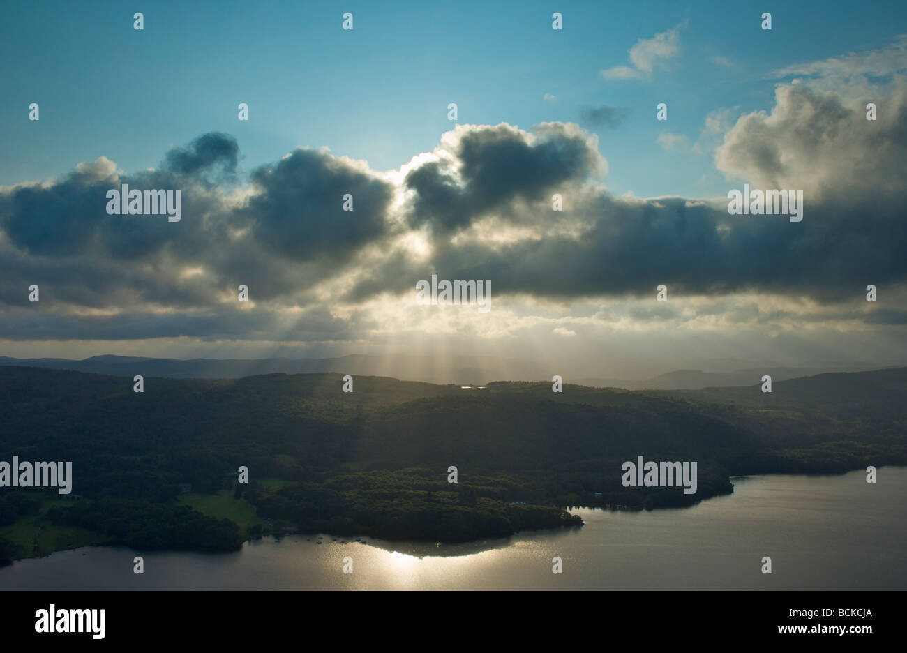 Rays of light coming from clouds: lake Windermere viewed from Gummers ...