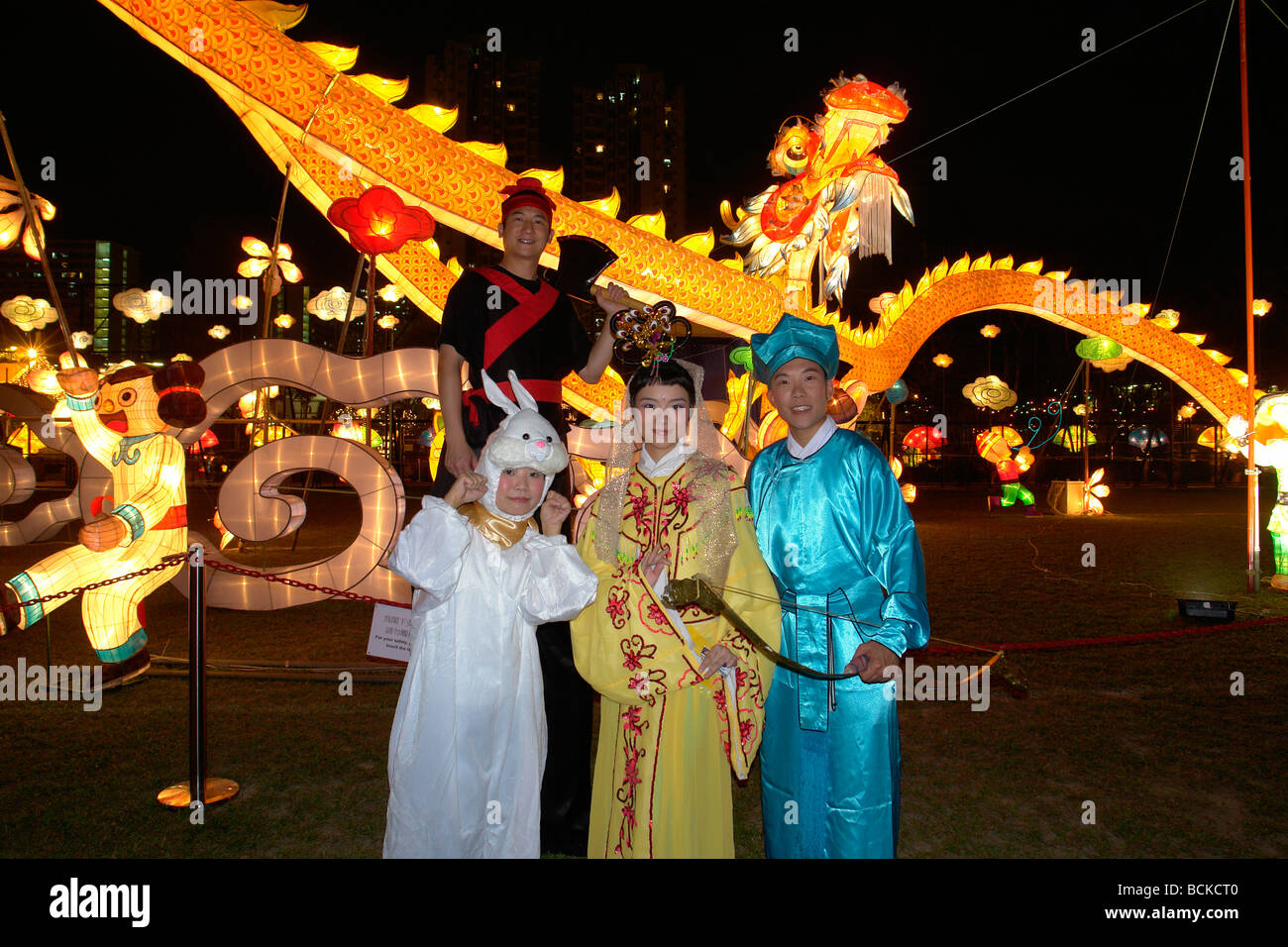 Chinese Mid-Autumn festival with dragon lanterns in park at dusk. Also called  Mooncake festival and Moon festival Stock Photo