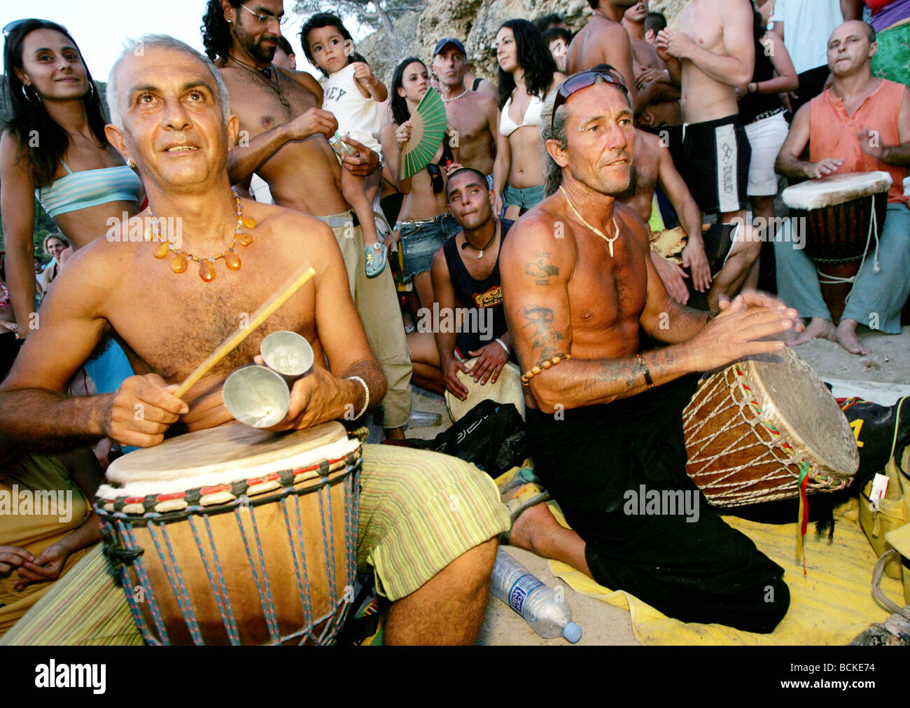 People playing bongos, Benirras beach, Stock Photo Alamy