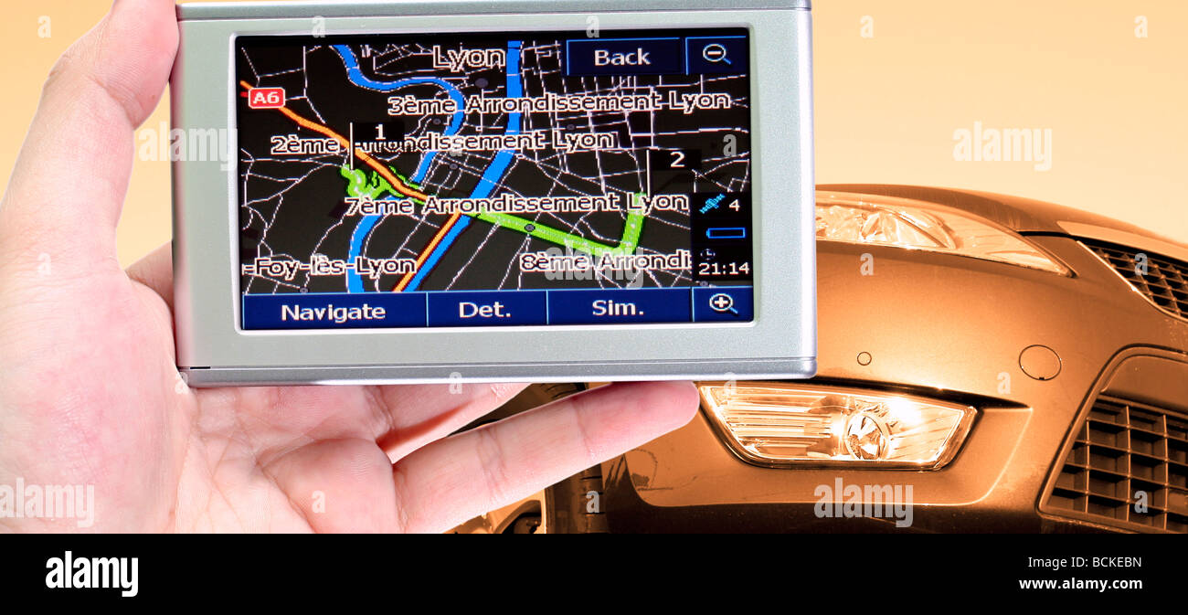 GPS Vehicle navigation system in a man hand Stock Photo Alamy