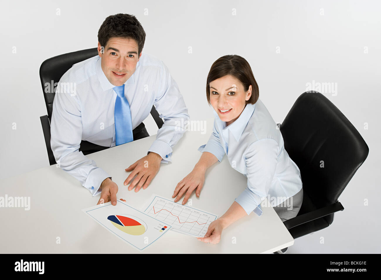 Colleagues with chart and graph Stock Photo