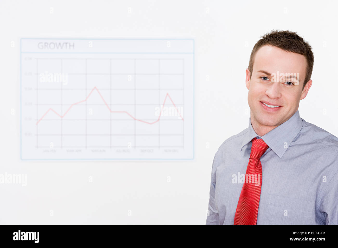 Office worker with graph Stock Photo