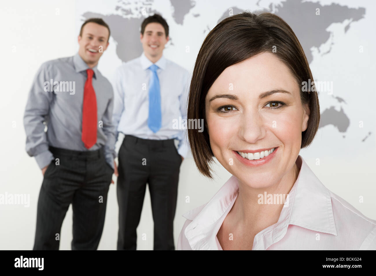 Businesswoman and businessmen Stock Photo