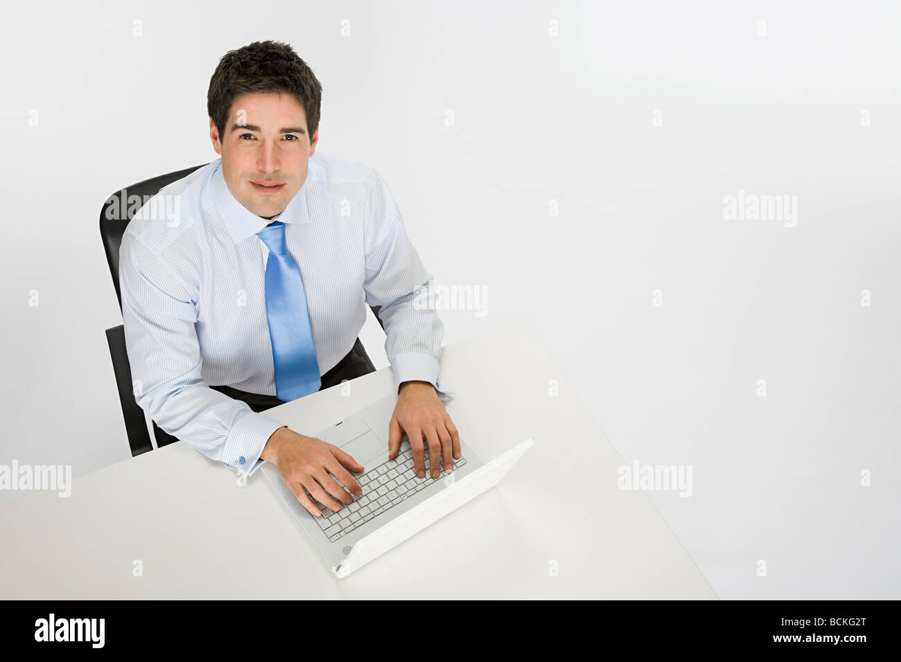 Office worker with laptop Stock Photo