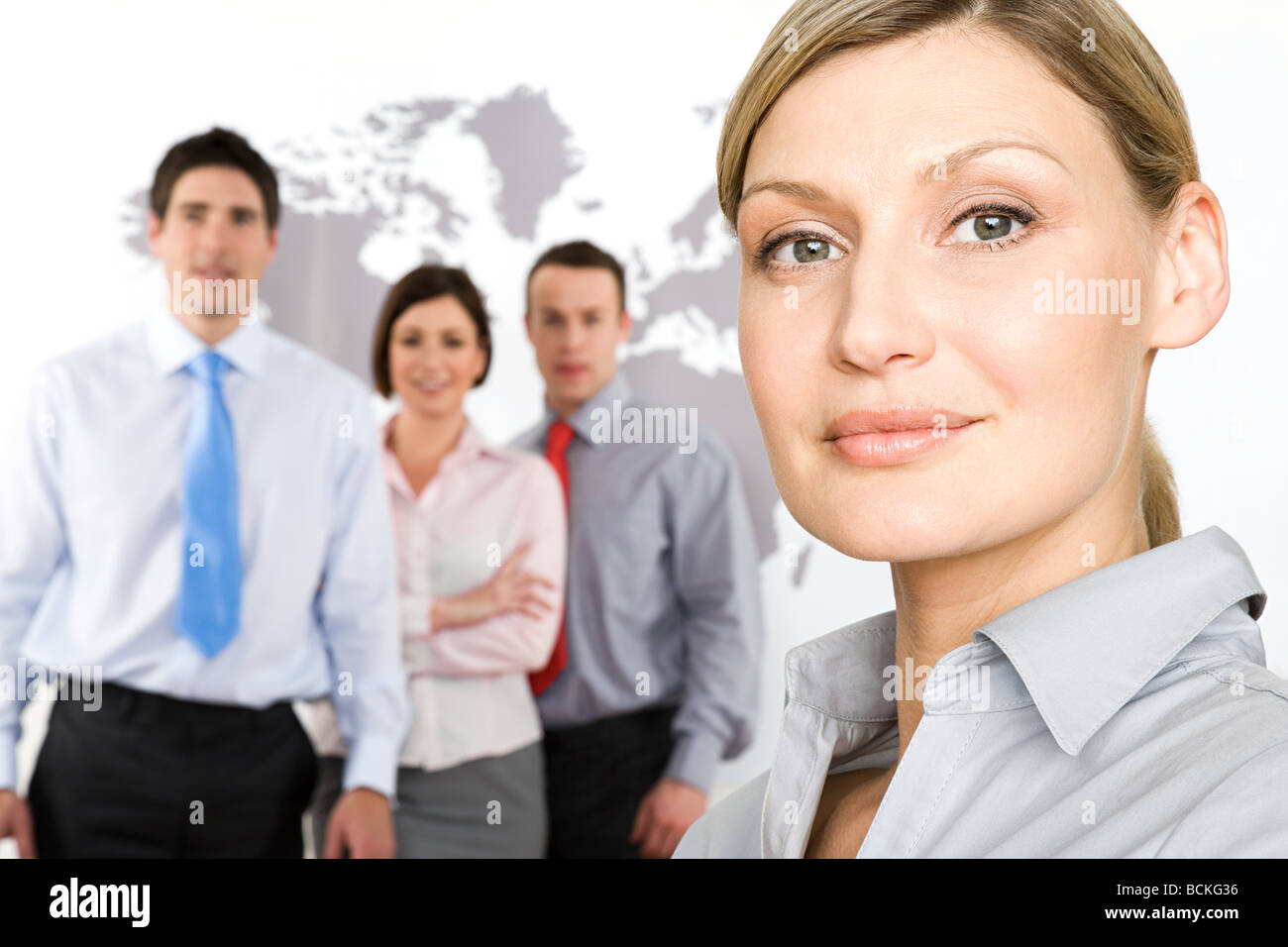 Businesswoman and colleagues Stock Photo