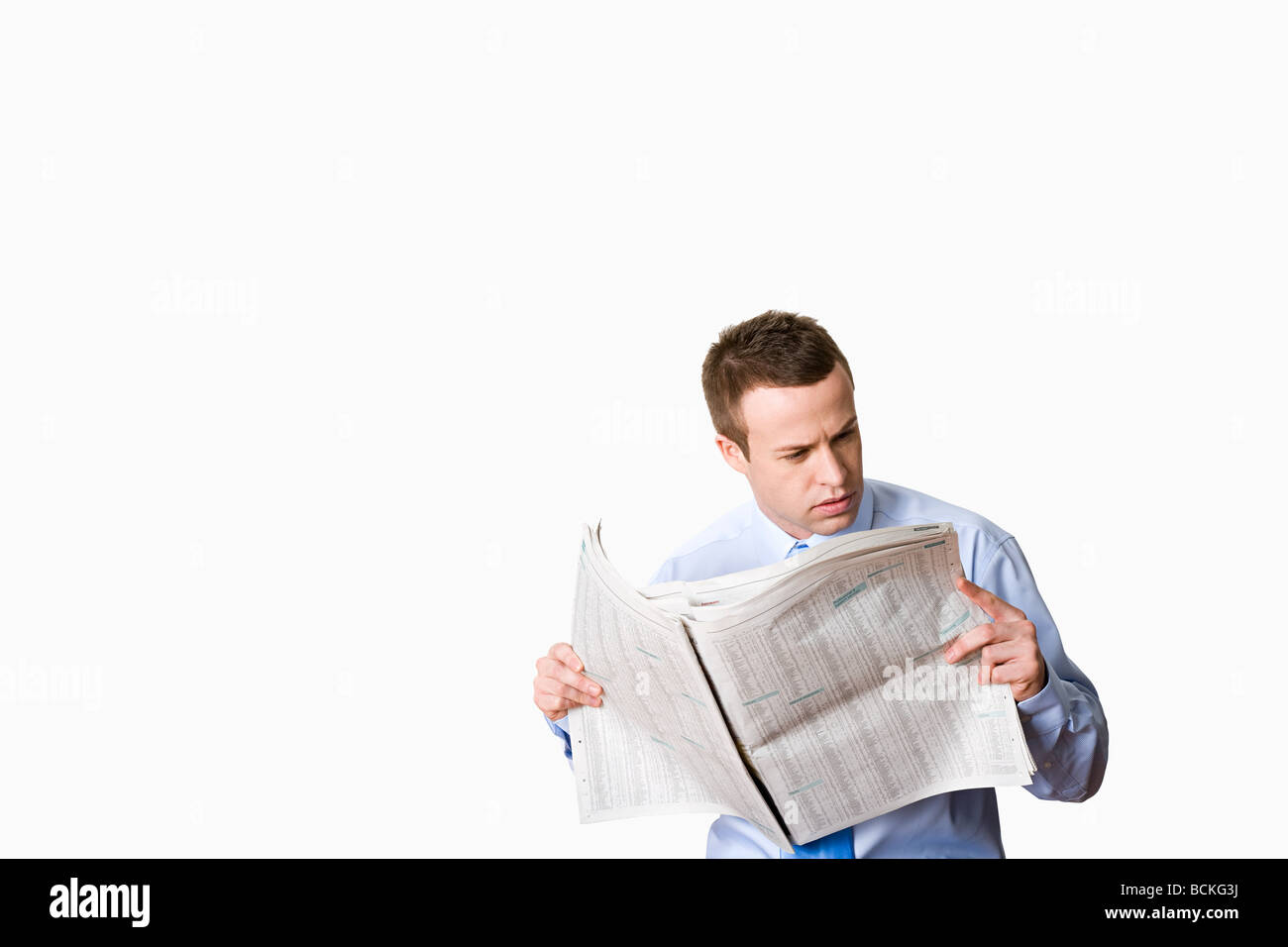 Office worker with newspaper Stock Photo