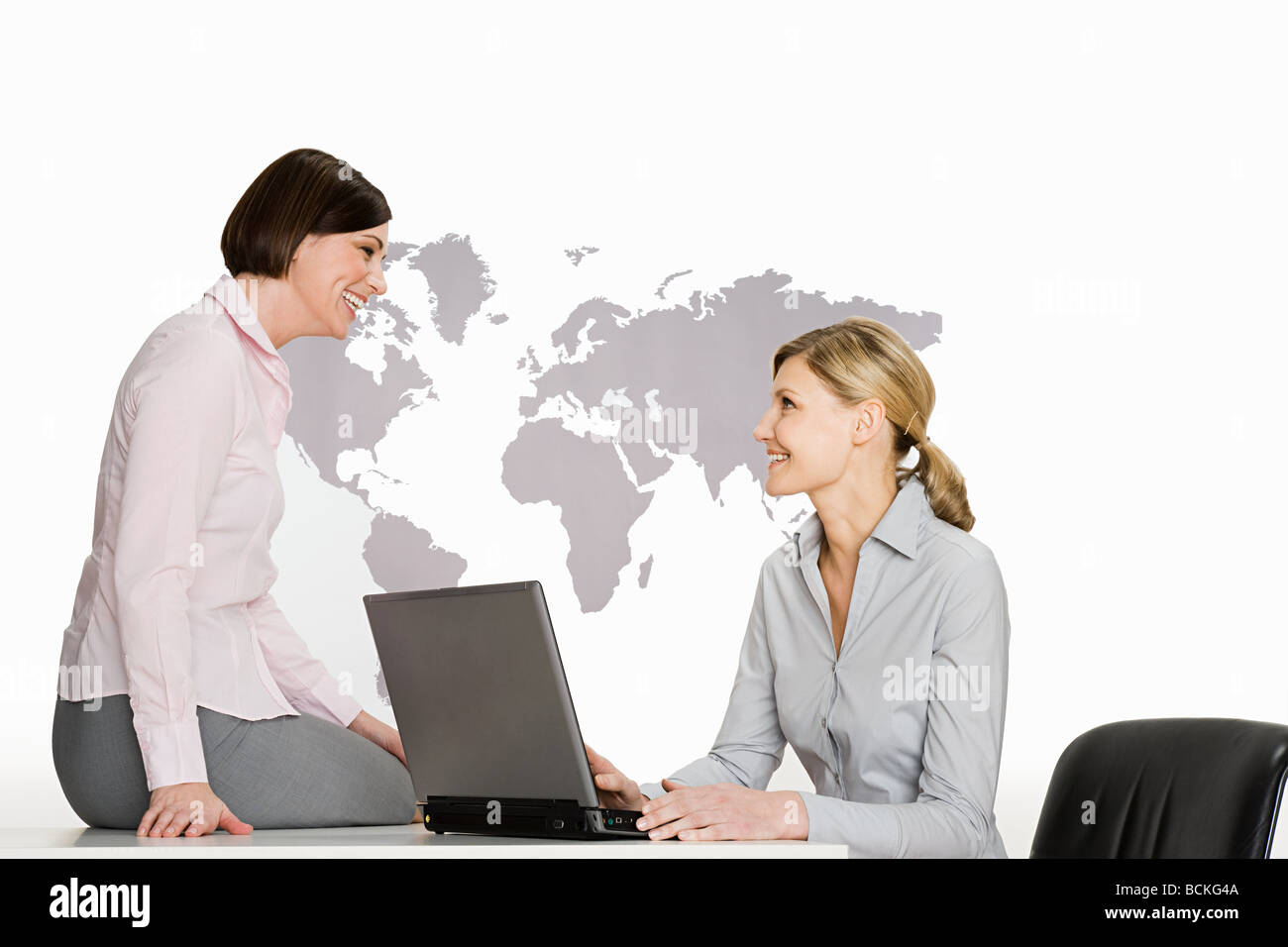 Businesswomen with laptop Stock Photo