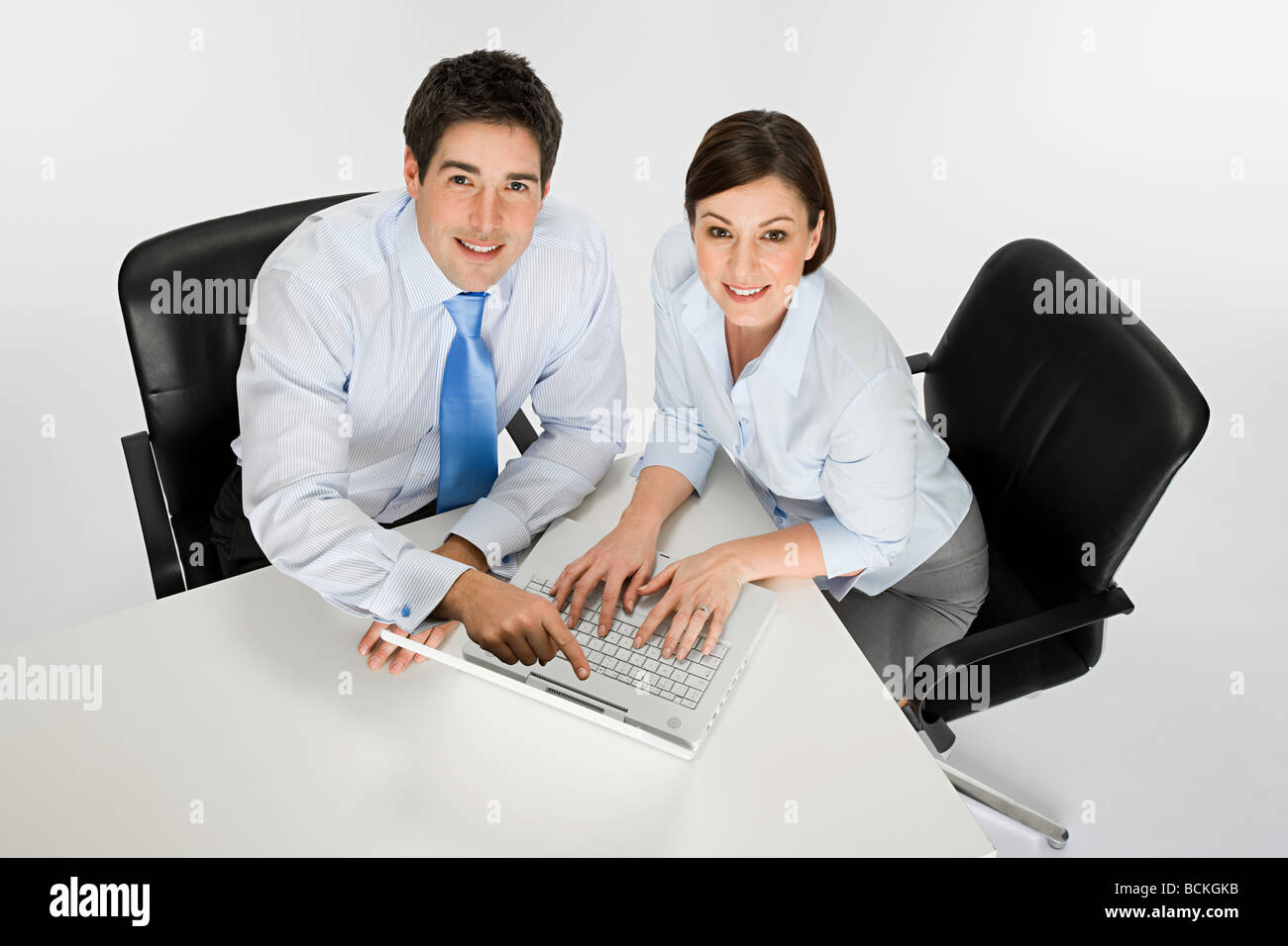 Colleagues with laptop Stock Photo