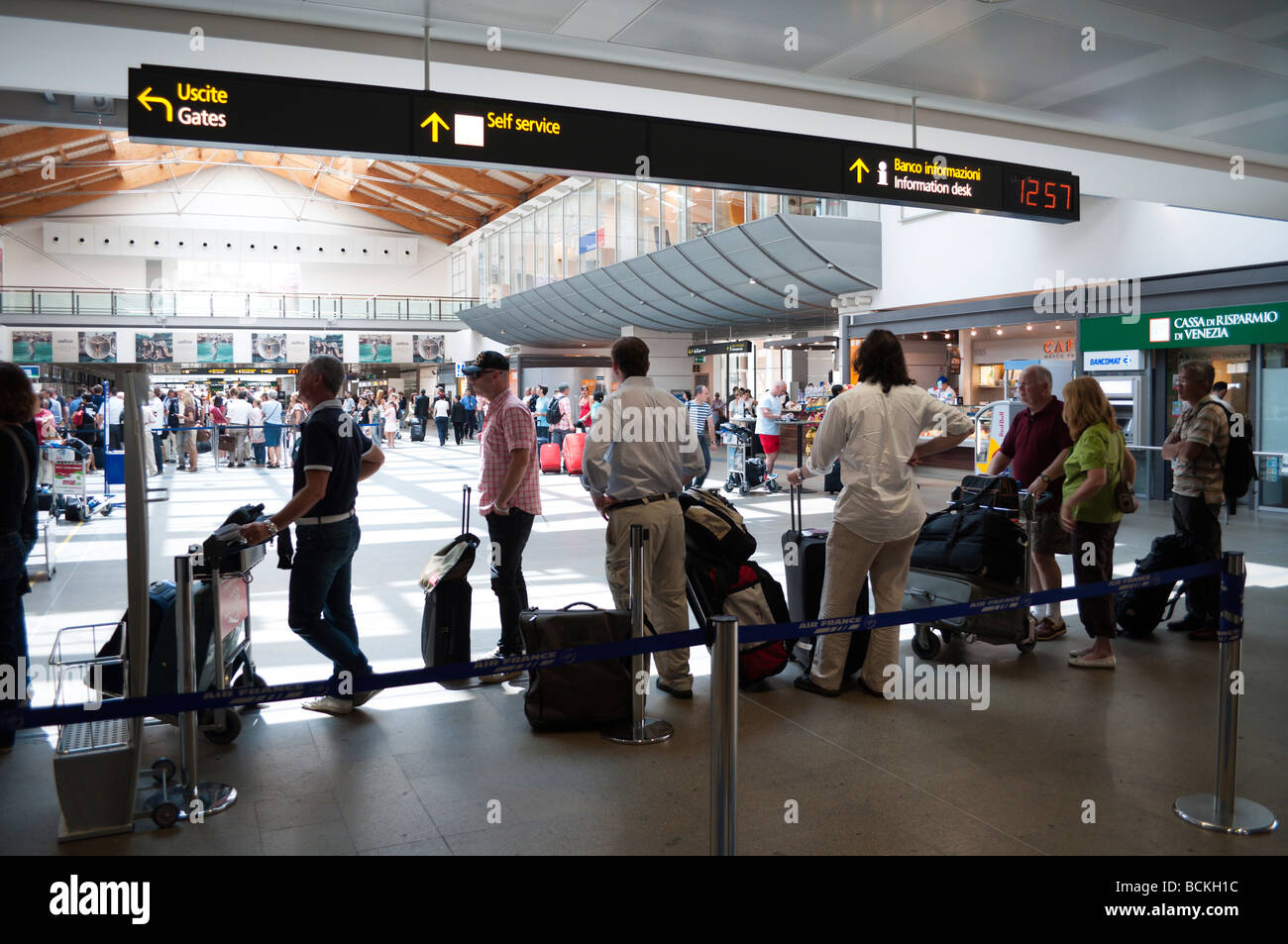 Venice 2009 queue for checkin with baggage at Marco Polo Airport departures  Stock Photo - Alamy