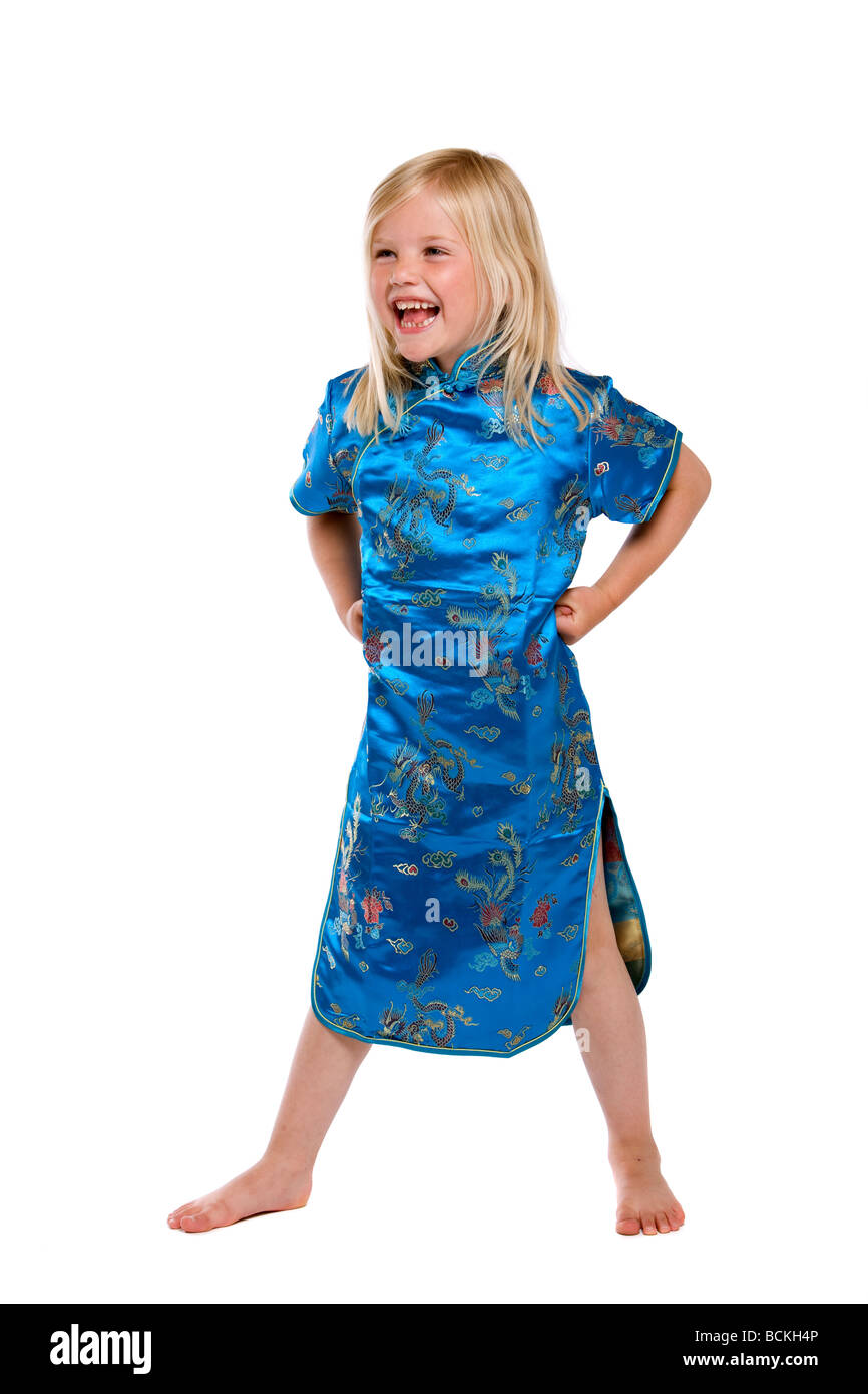 Pretty blond four year old girl having a good time and laughing Stock Photo