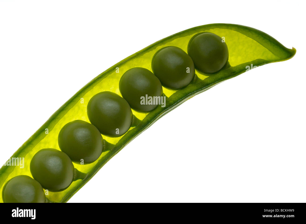 Seven peas in a pod on white background Stock Photo