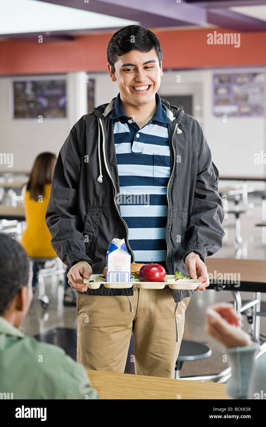 Male school student at lunch Stock Photo