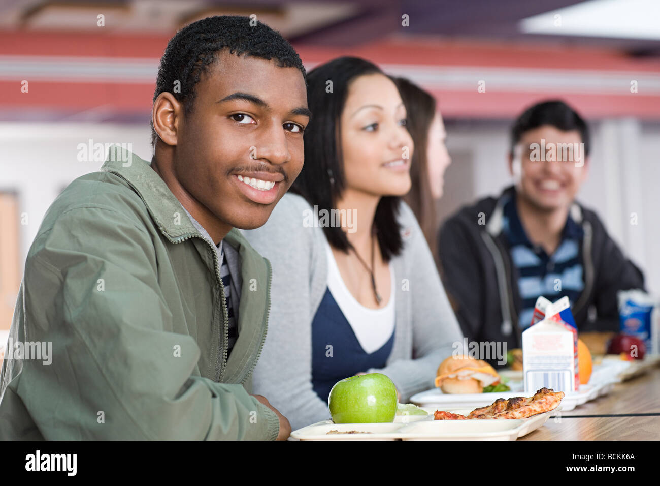 School students having lunch Stock Photo