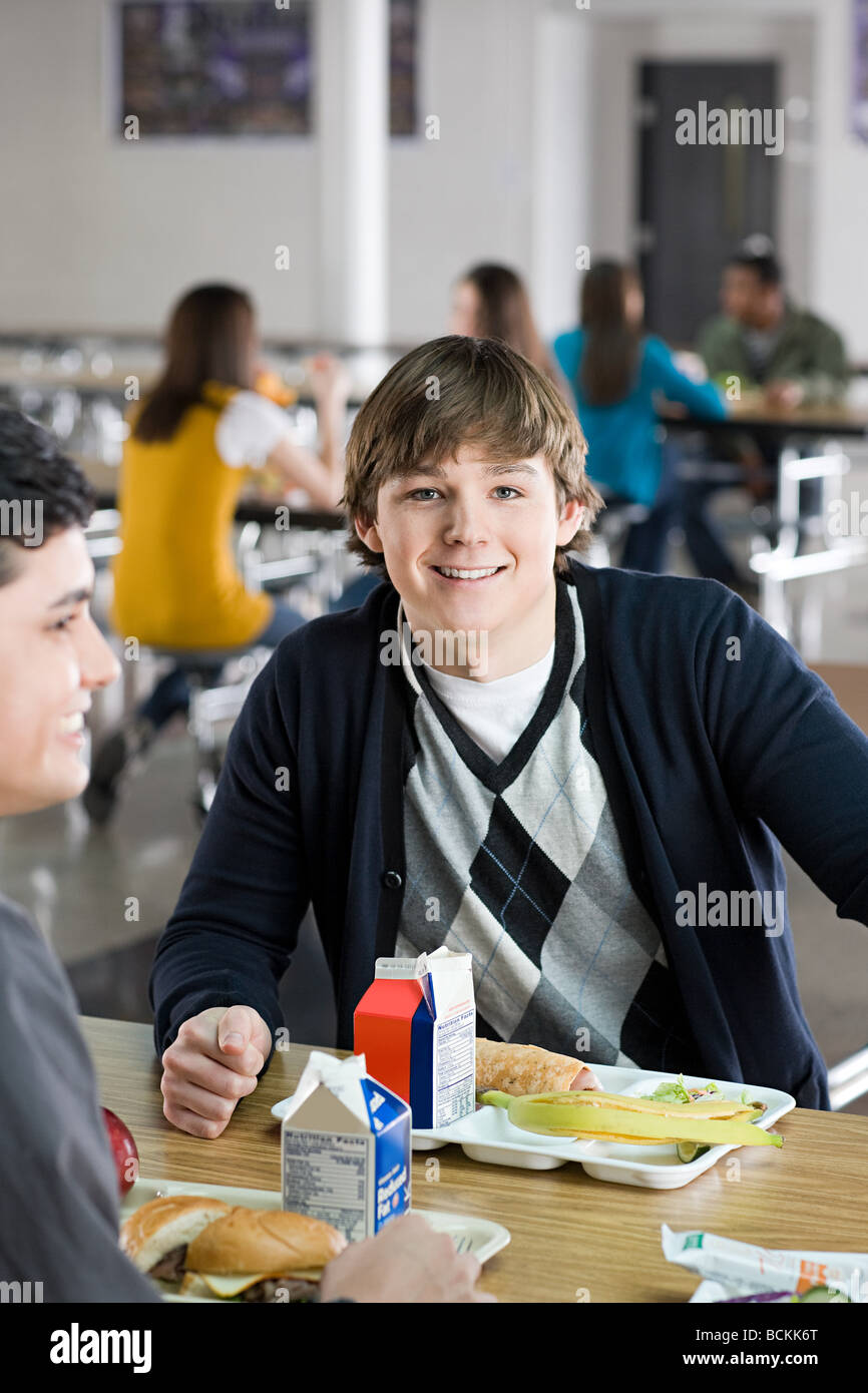 Male school students at lunch Stock Photo