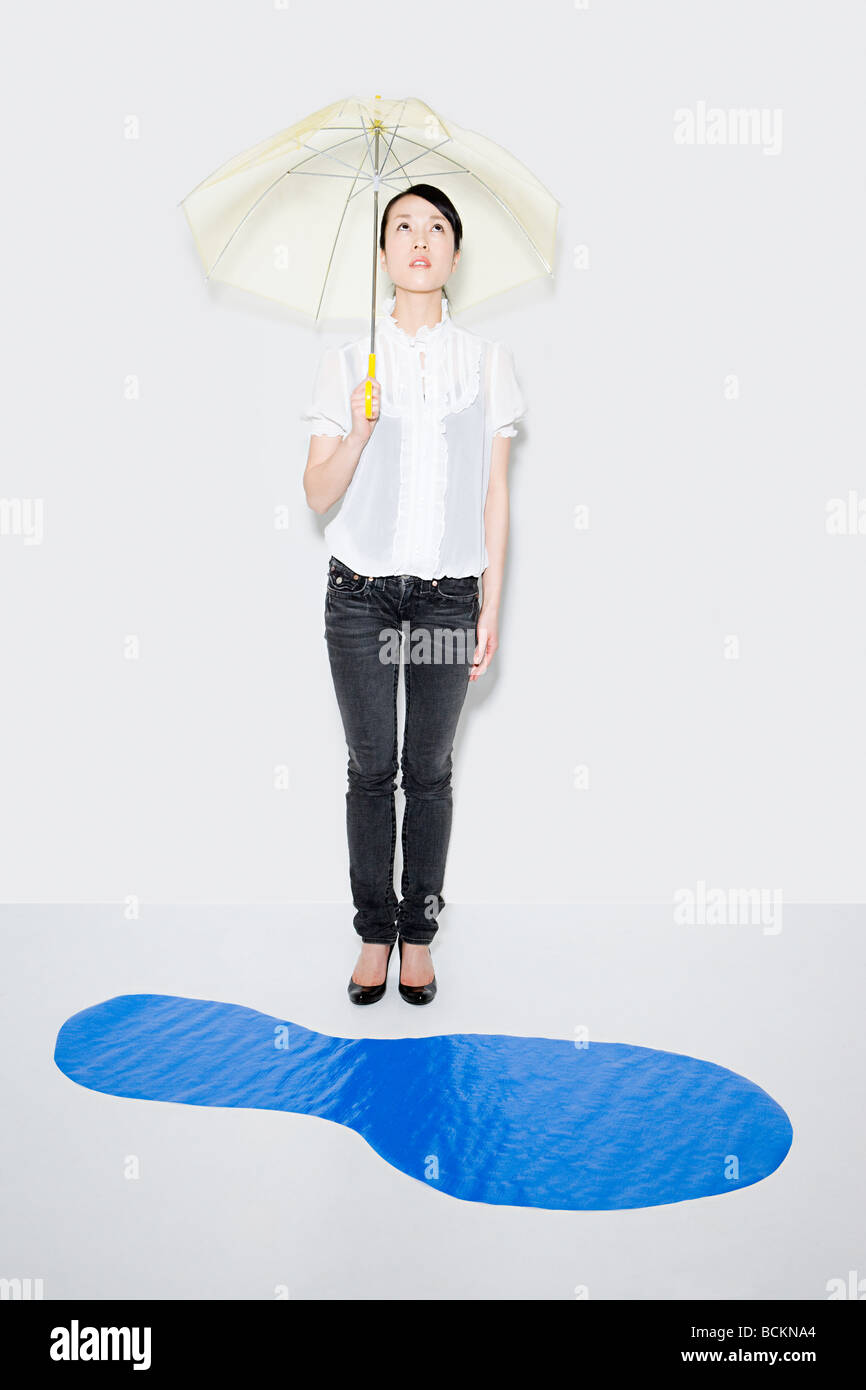 Woman with umbrella Stock Photo - Alamy