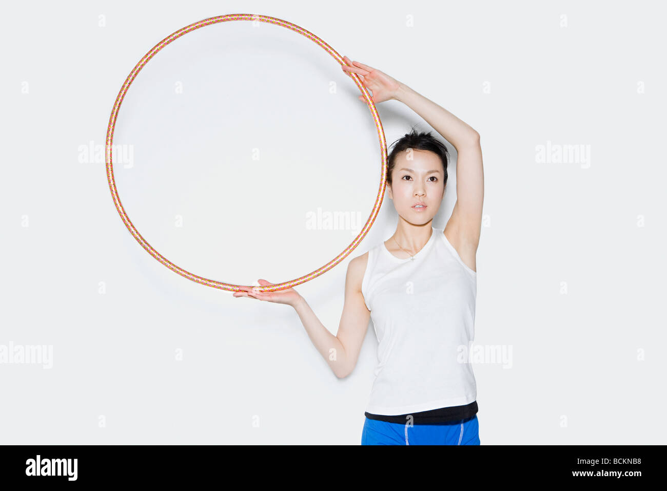 Woman holding hoop Stock Photo