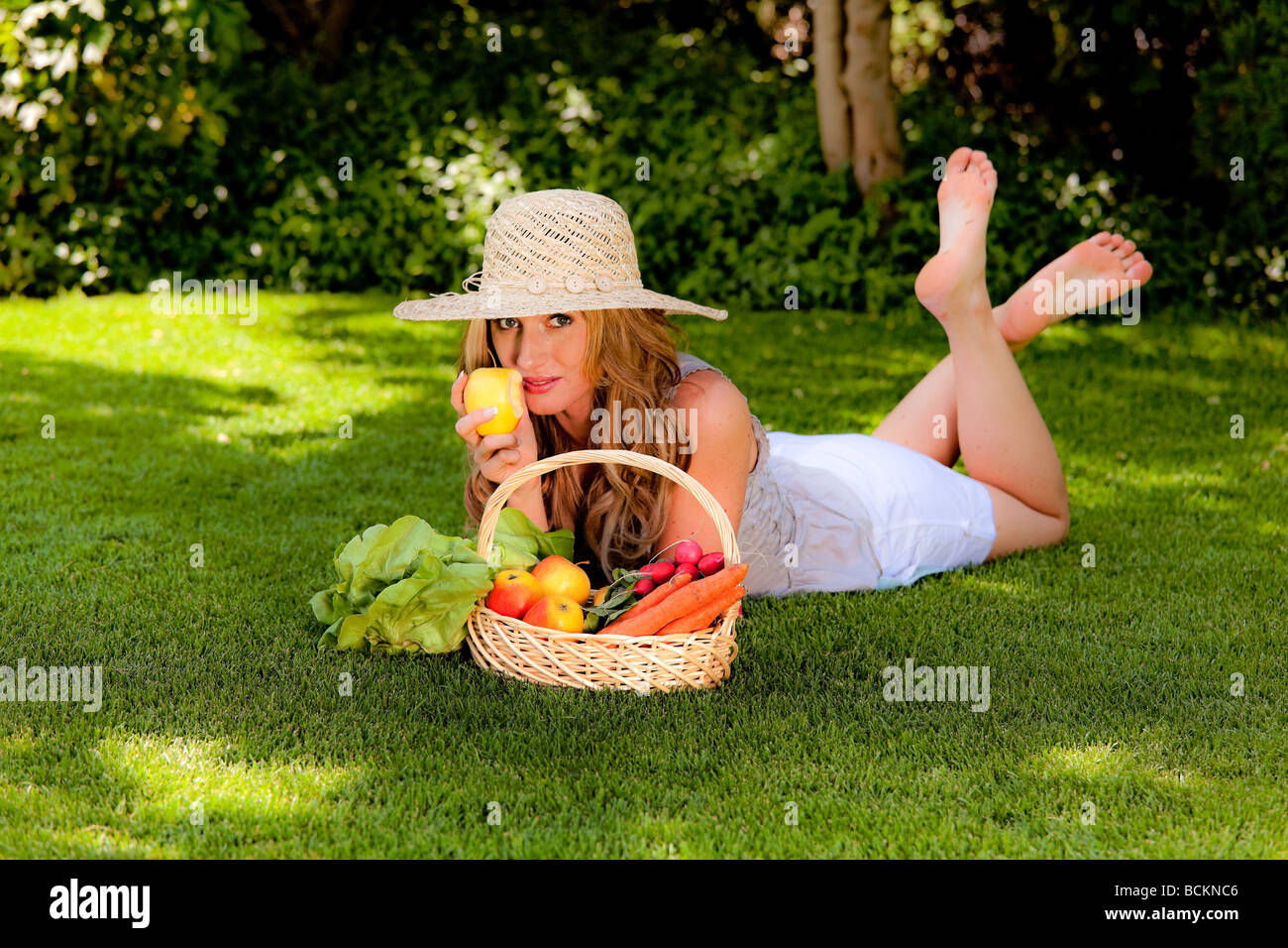 Fruit and vegetables in the basket with woman Stock Photo - Alamy