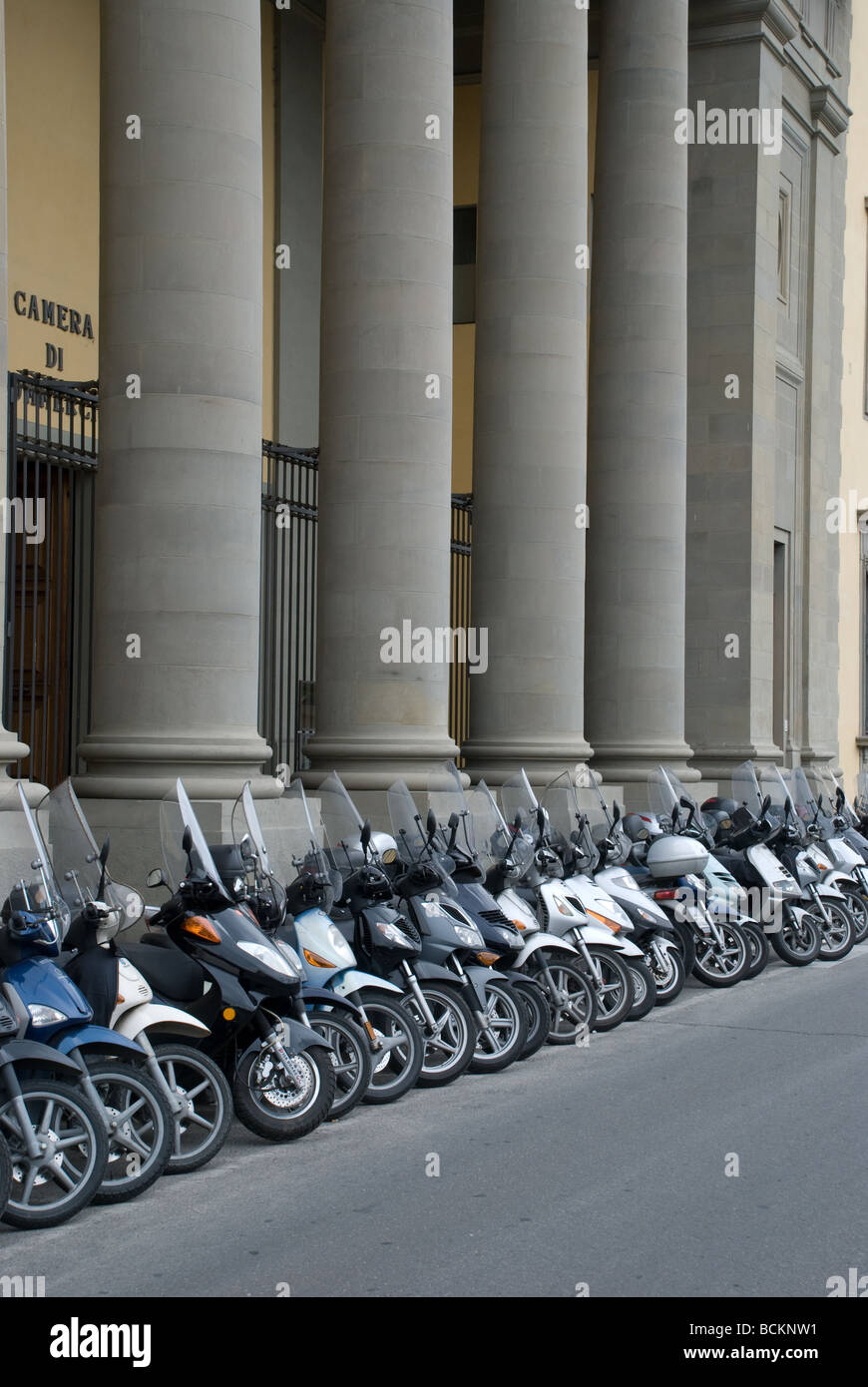 Line of scooters on the street in Florence Stock Photo Alamy