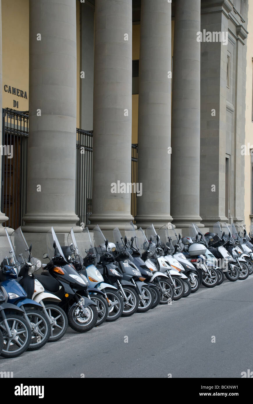 Line of scooters on the street in Florence Stock Photo