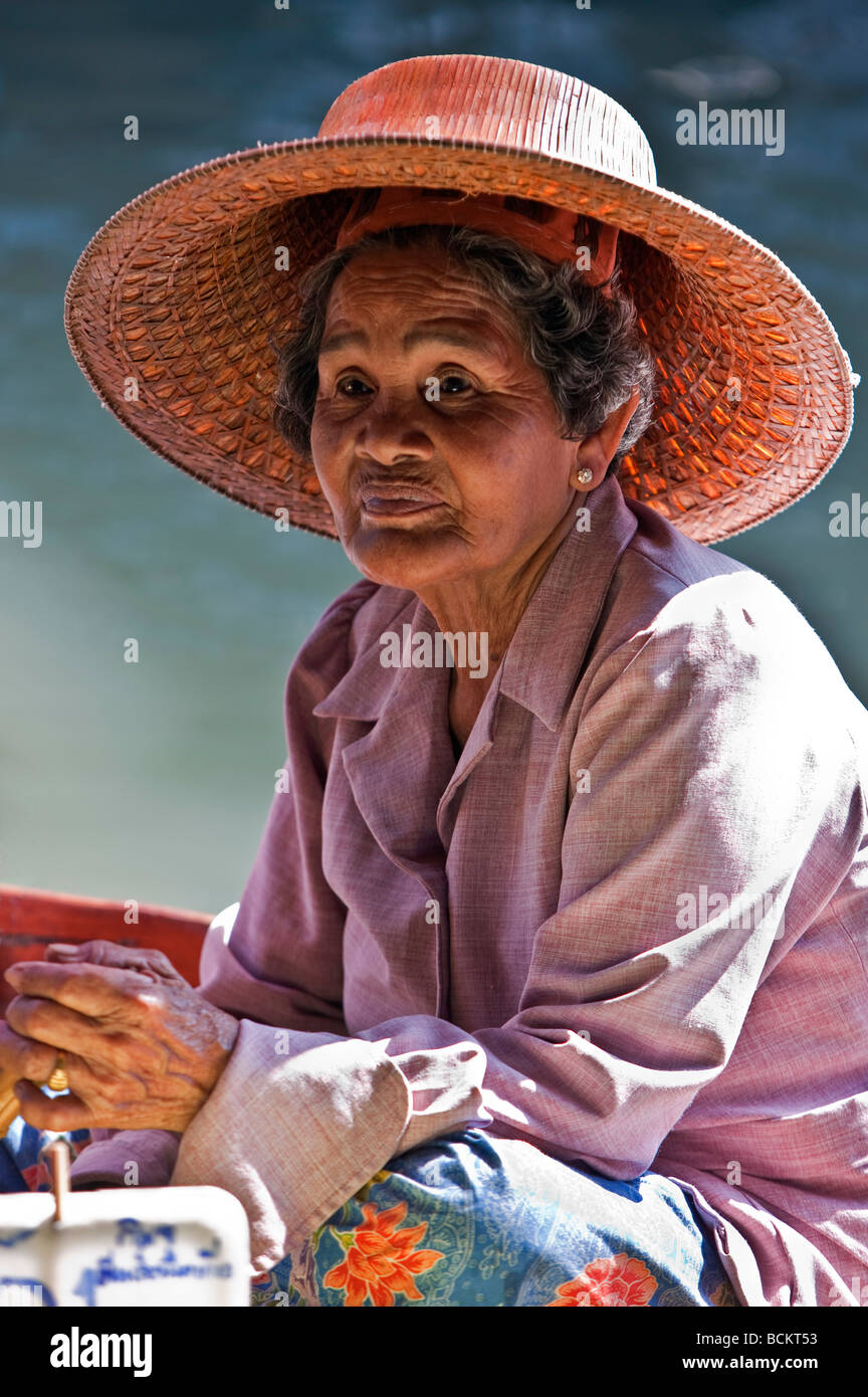 Thailand. An old lady at the bustling floating market at Damnern Saduak, 80 km southwest of Bangkok. Stock Photo