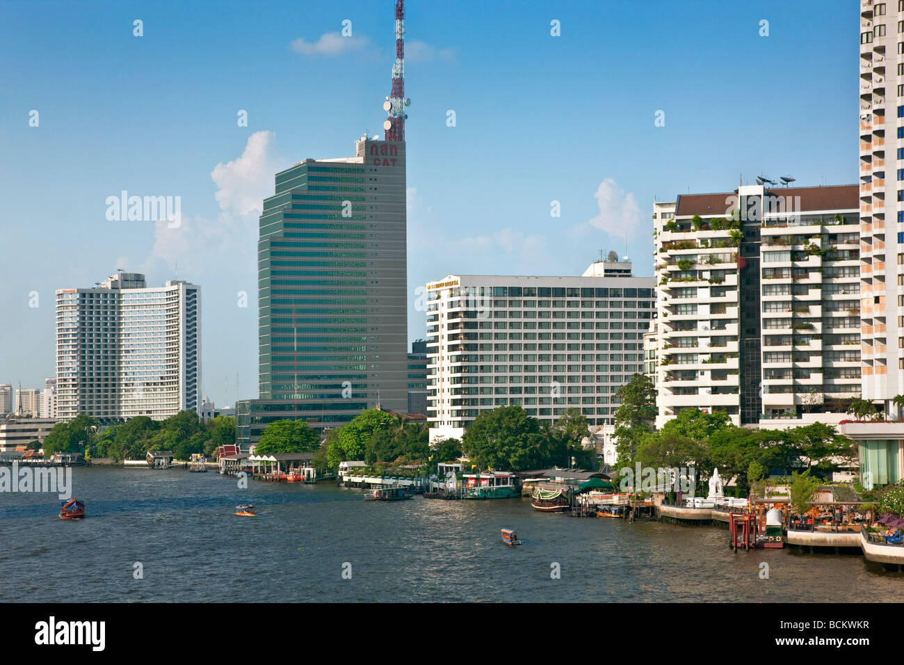Thailand. A view of the impressive development along the Chao Phraya River where many five-star tourist hotel are situated. Stock Photo