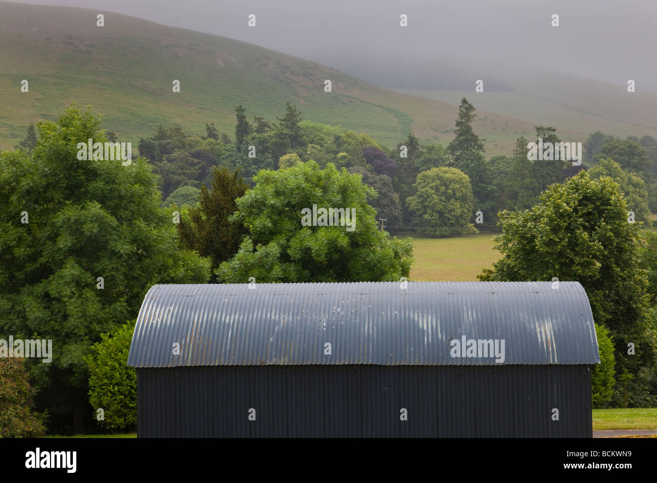 Black corrugated metal barn Stock Photo