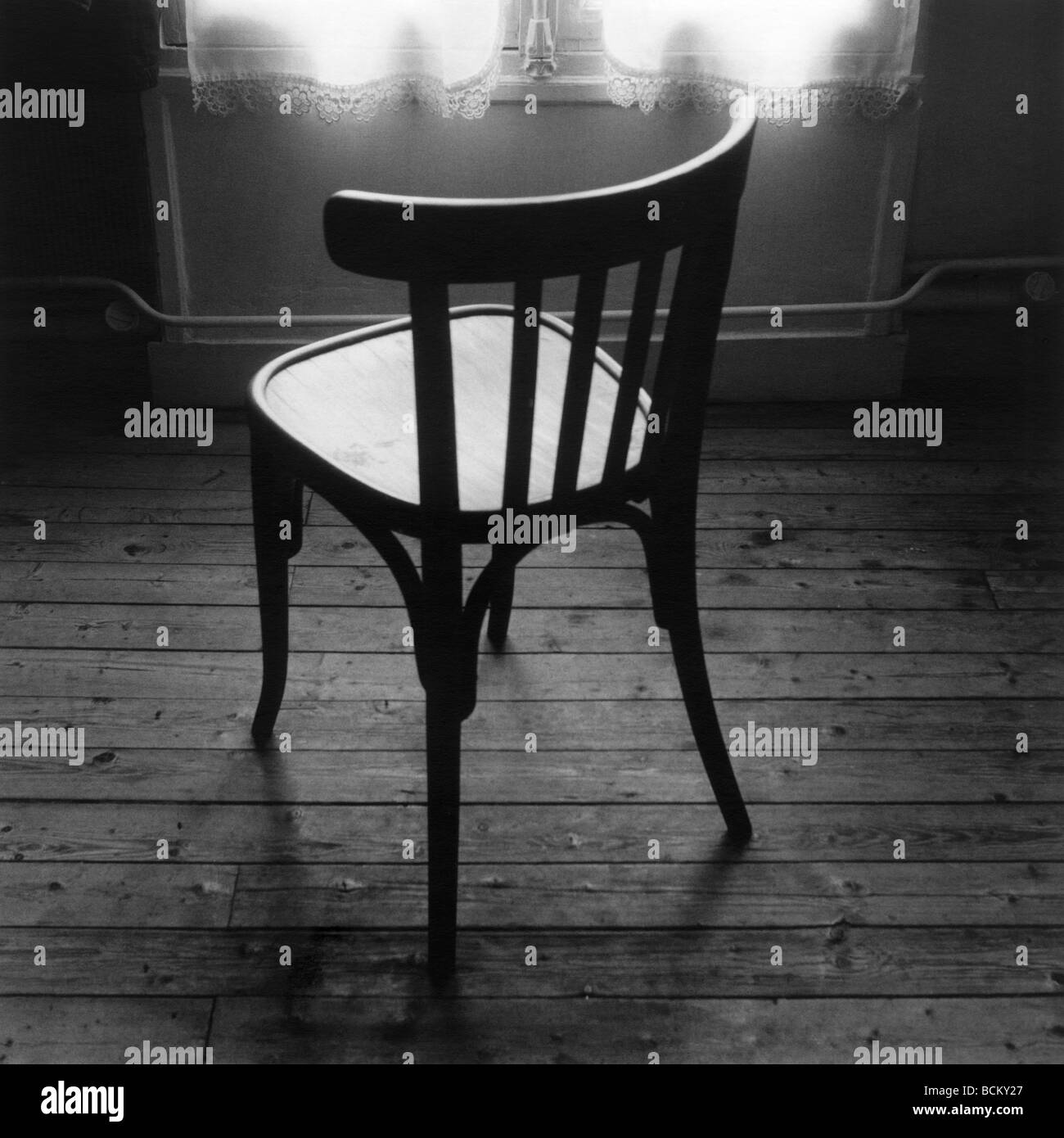 Chair by window, b&w Stock Photo Alamy