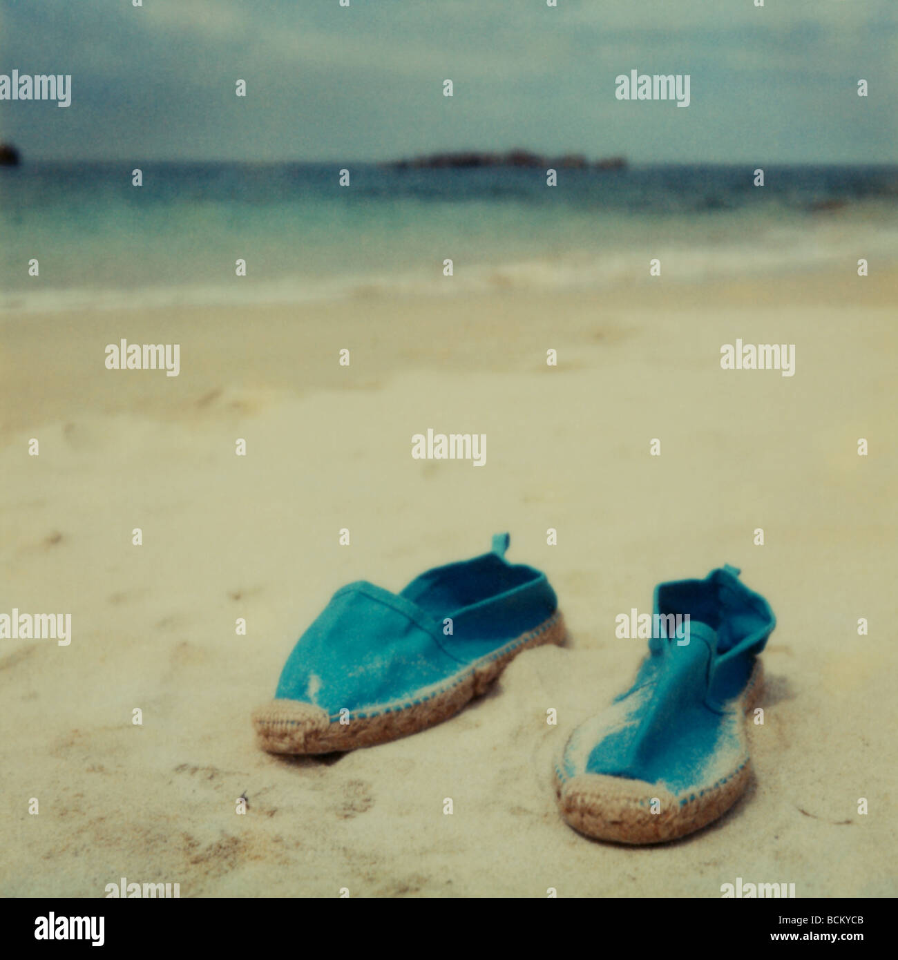 Shoes on beach Stock Photo Alamy