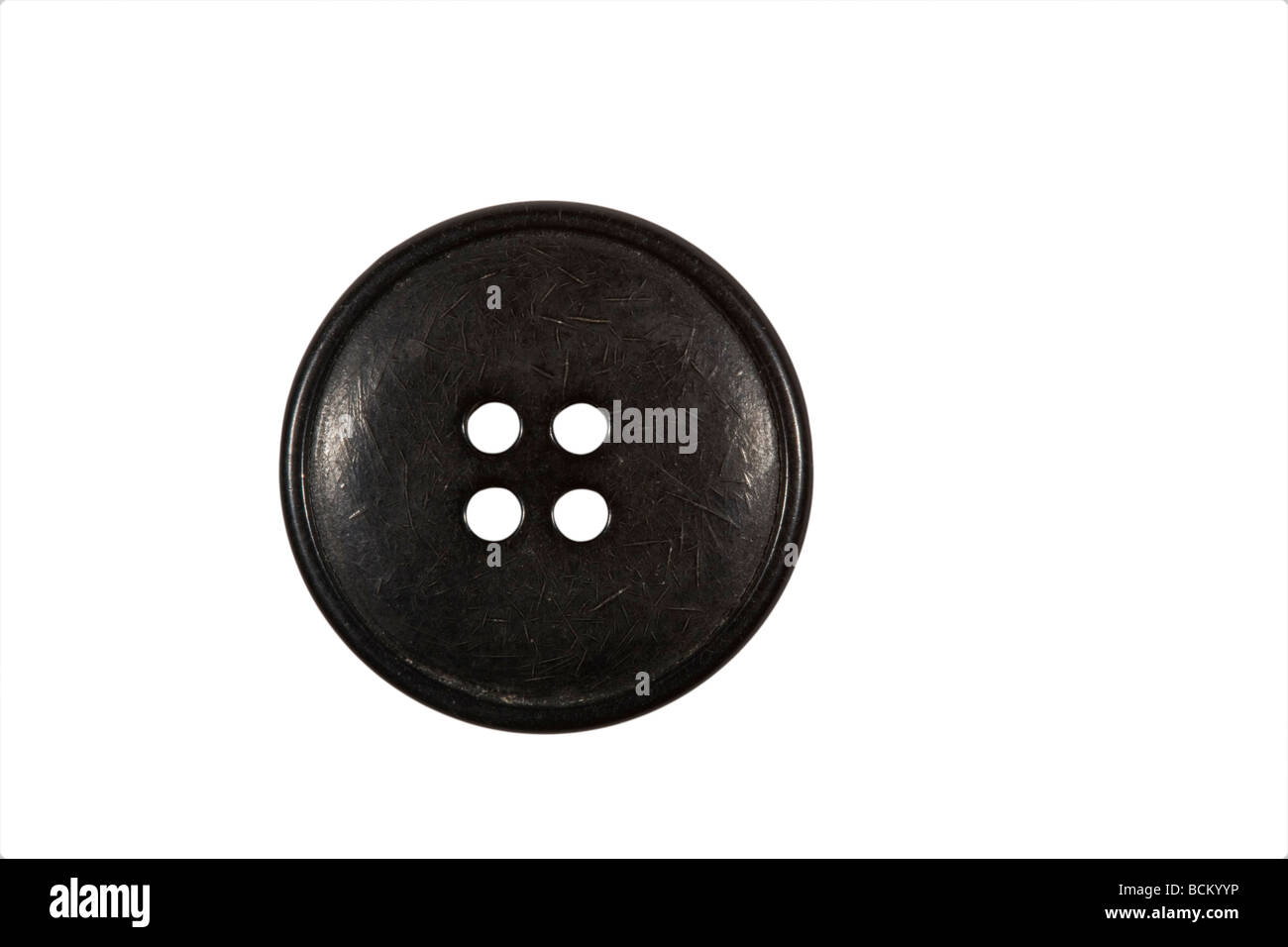 Black coloured button Stock Photo - Alamy