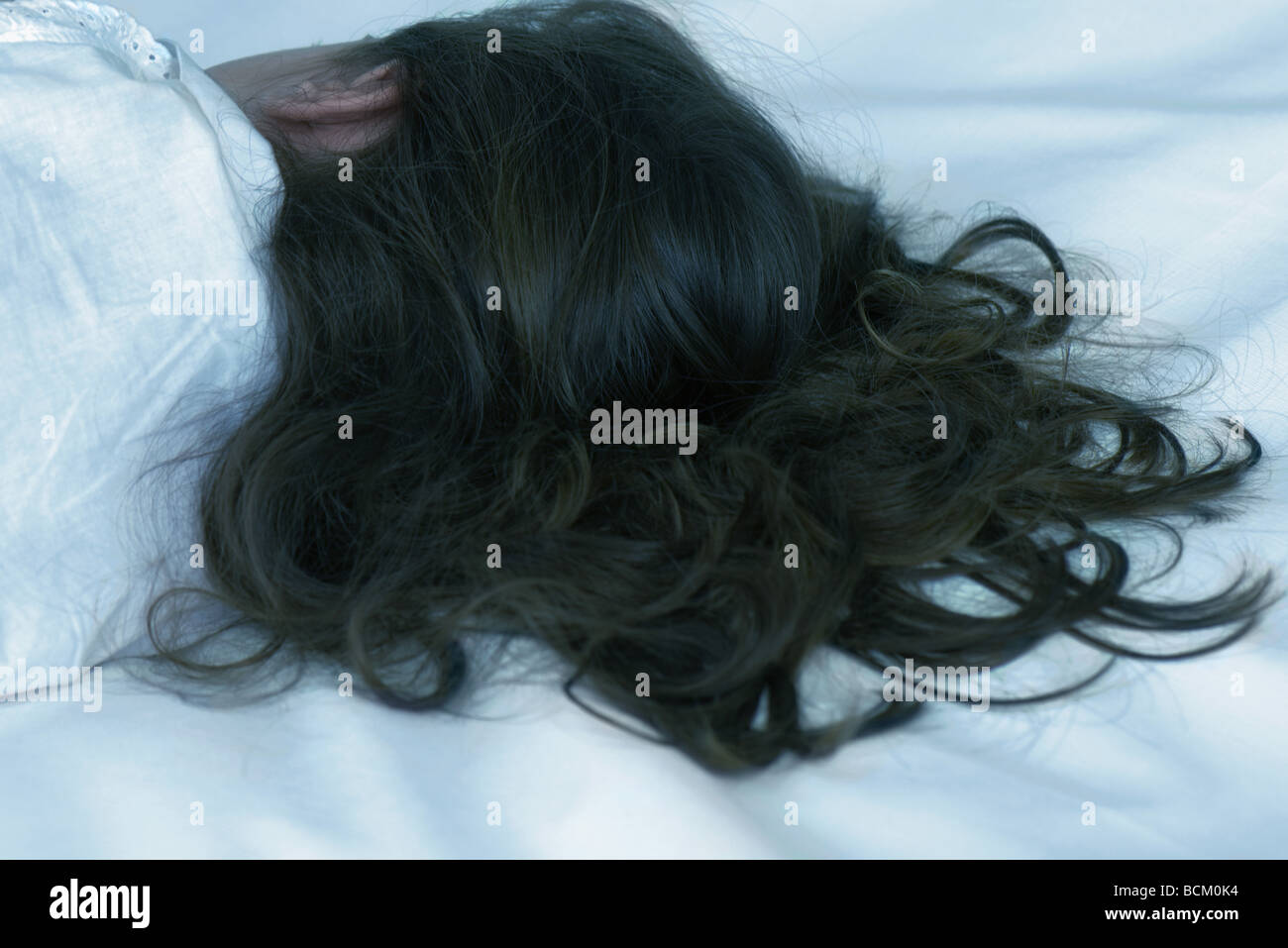 Little girl sleeping, head and shoulders, rear view Stock Photo