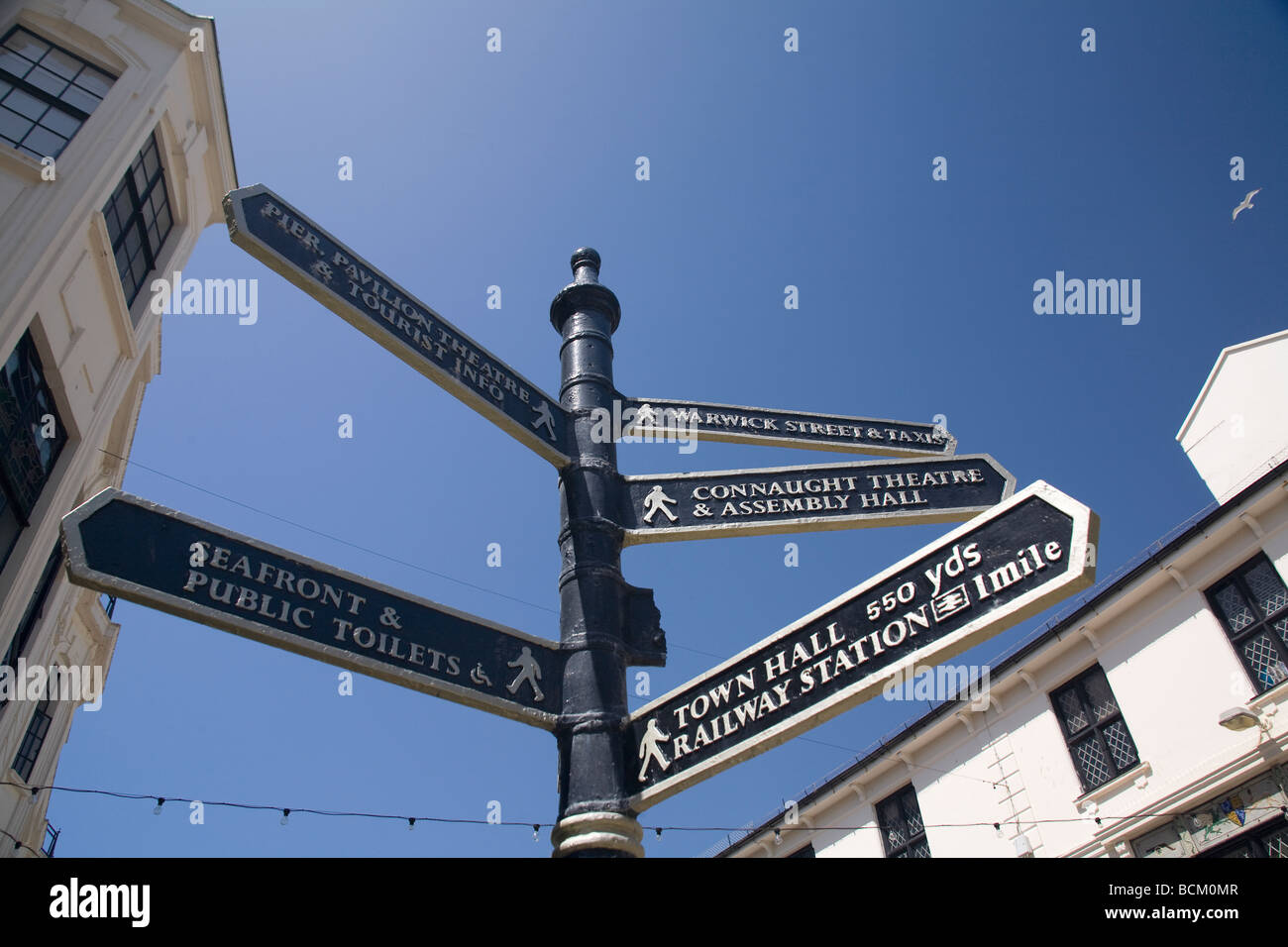 Signpost pointing to various destinations in the Worthing area. West Sussex, UK Stock Photo