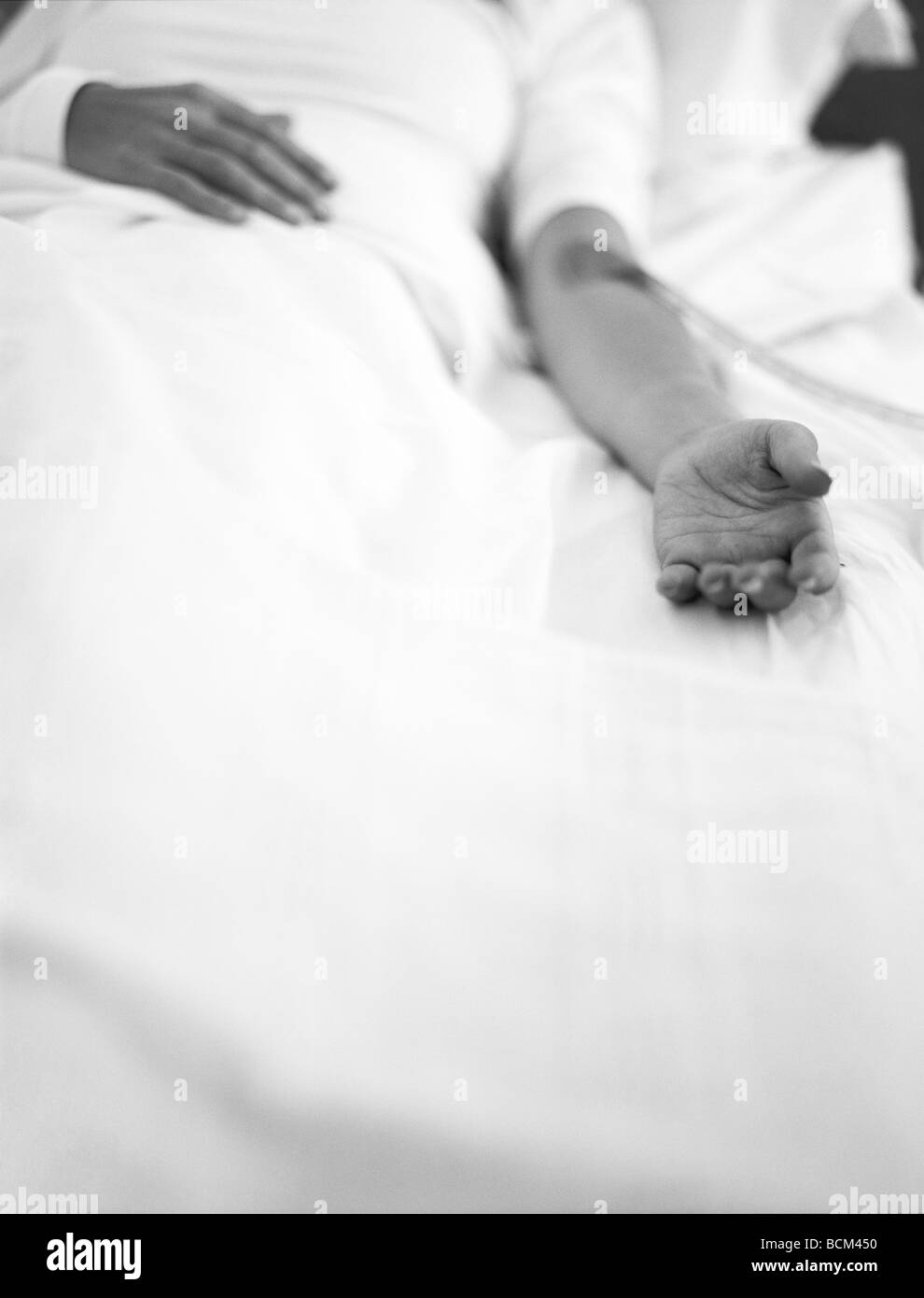 Lying on bed woman Black and White Stock Photos & Images - Alamy